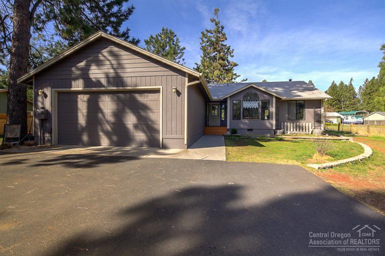 Nearly an acre in SW Bend, horse friendly & NO HOA! Comfortable single level home w/gated entry & paved drive, great for kids & pets. Hardwood floors, tons of windows & new cabinets in kitchen. Spacious Master Suite, ample sized bedrooms, formal dining & breakfast nook. Back deck overlooking pasture/yard for summer fun, outbuildings for storage/tack room. Property is fenced & cross fenced. Plenty of room to build your dream shop & RV & toy storage! Easy access to the Old Mill & hwy.