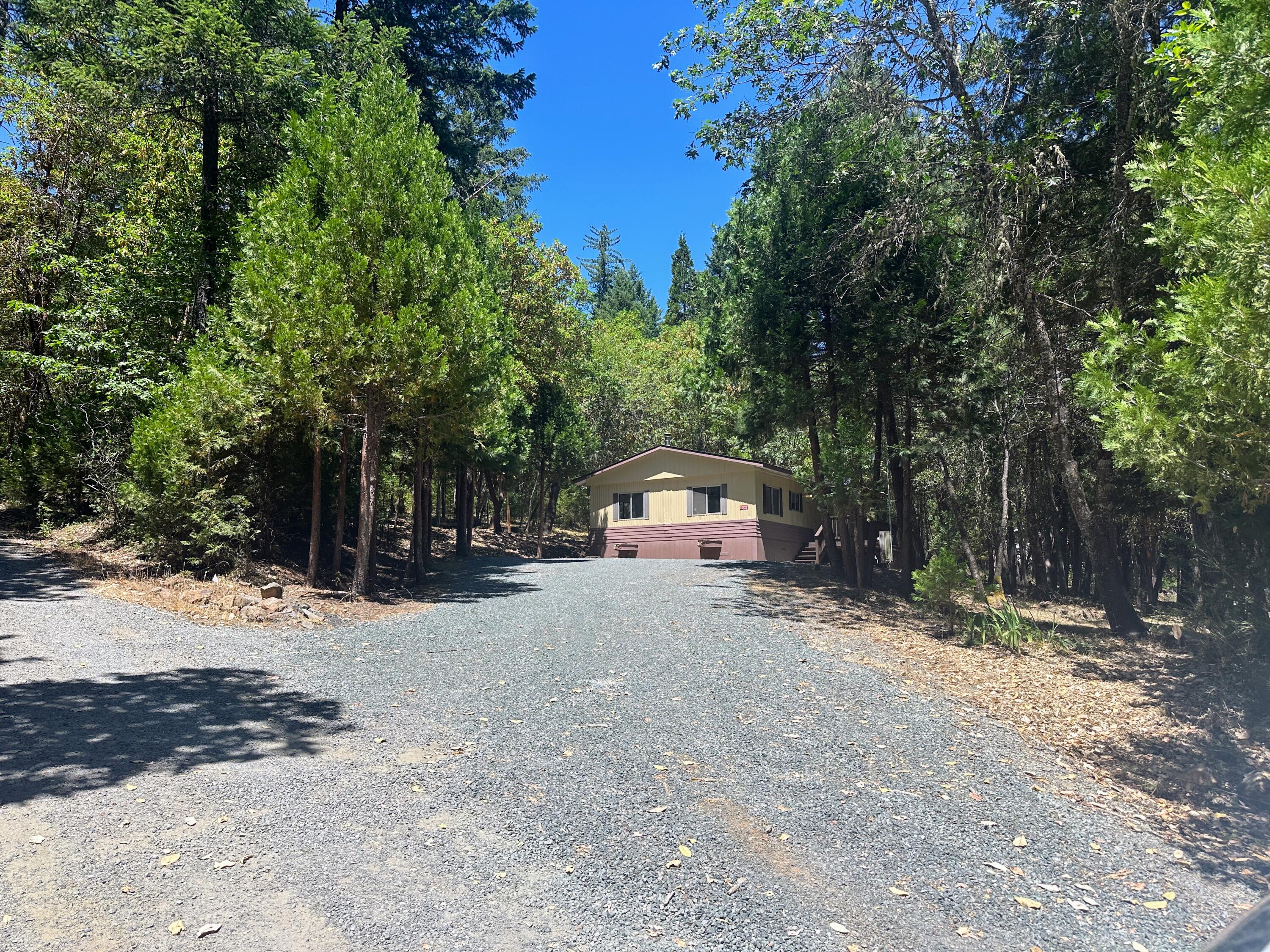 Back active no Fault of the property Nearly 30 acres with a 3 bed, 1.5 bath 960 square ft manufactured home. Located between the towns of Rogue River and Grants Pass the property is tucked away in a private setting. Nearby access to the Rogue River makes this home an ideal choice outdoor enthusiasts. Plenty of trees and mostly level terrain makes this a peaceful place to enjoy rural living in SW Oregon.