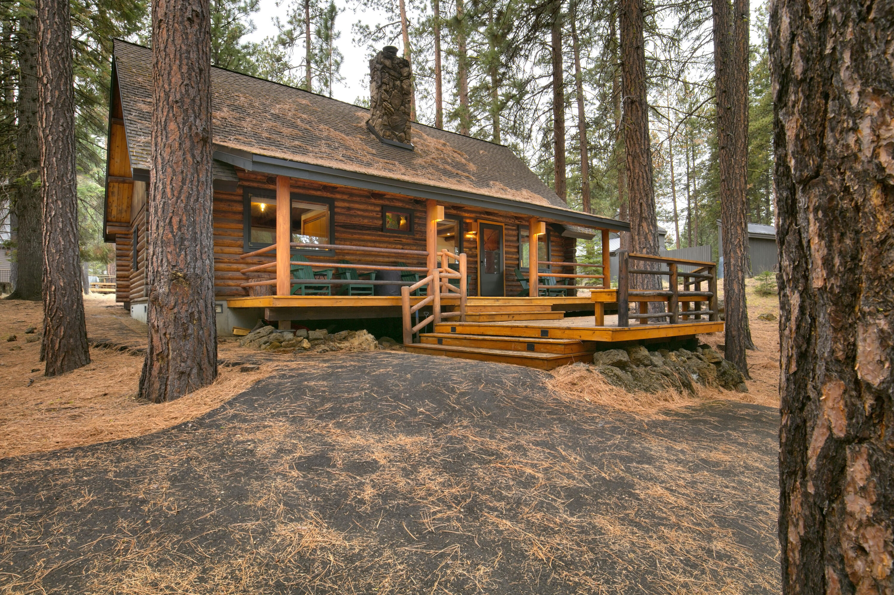 Have you dreamed of owning a beautiful log home at Black Butte Ranch? Here's your chance! This delightful two-story home boasts three bedrooms and two bathrooms, with the primary suite conveniently located on the main floor. Updated yet full of character, it's an ideal spot for making cherished memories. Enjoy the new flooring, refreshed drywall, and vaulted ceilings in the upstairs loft. Unwind by the wood-burning fireplace, on the covered porch, or on the expansive deck, and make the most of the modern kitchen. The home is nestled on a lovely, low-maintenance lot surrounded by pine trees. Experience the year-round charm of Black Butte Ranch with activities such as golf, tennis, swimming, biking, skiing, and the newly opened Lodge. A short stroll takes you to the South Meadow pool complex and a picturesque path to the meadow. Don't let this opportunity slip away!