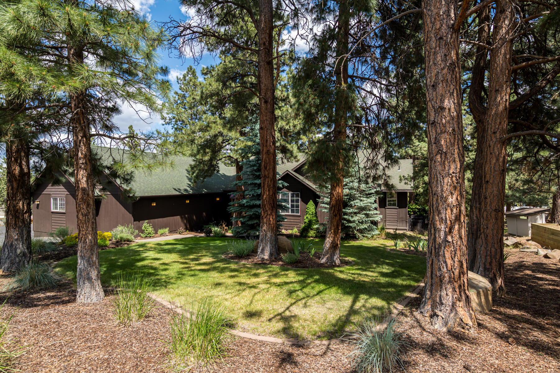 Beautiful updated two-story home on nearly 1 acre with 4 bedrooms and 3 1/2 baths offers plenty of space for a comfortable living arrangement. The living room and bonus room provide additional areas for relaxation or entertainment.
The fenced backyard with a water feature and hot tub adds a touch of luxury and serenity to the lush outdoor space. It's a great feature for relaxation and enjoying the natural surroundings. The play area is perfect for children to have fun and engage in outdoor activities.
Having a shop with carport bays in addition to the heated 3 car garage is excellent for those who enjoy DIY projects, need extra storage space, or have hobbies that require a dedicated workspace. It provides a convenient area to work on projects or store tools and equipment.

Overall, this property offers a combination of functional indoor space, outdoor amenities, and additional structures that can enhance your living experience. Potential for generational living.