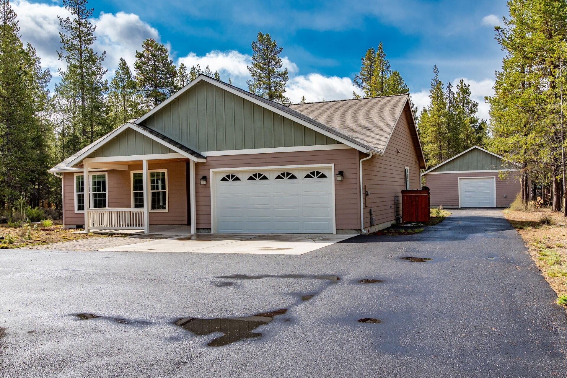 Price Improvement! Are you looking for a newer home with a Shop? Look no further. This 2018 built single level with a 1200 sq ft shop is looking for new owners. This lightly lived in home is 1785 sq ft and sits on 1.06 acres. Located on a dead end street, it has a paved circular drive, RV hook up, high speed internet, ATT septic system, private well. The home features hickory soft close  cabinets, soft close drawers, full back splash, granite counter tops, LVP flooring through out. Propane runs the oven & fireplace. The primary suite has a tiled shower, dbl vanity, soaker tub and huge walk in closet. The shop has a concrete floor and power. Covered cedar front porch and over sized back patio is perfect for bbq's or nighttime star gazing. This location is close to all Central Oregon recreational activities including Mt. Bachelor ski resort. Just 10 short minutes to Sunriver and 20 minutes to Bend.  Call today for your private tour.