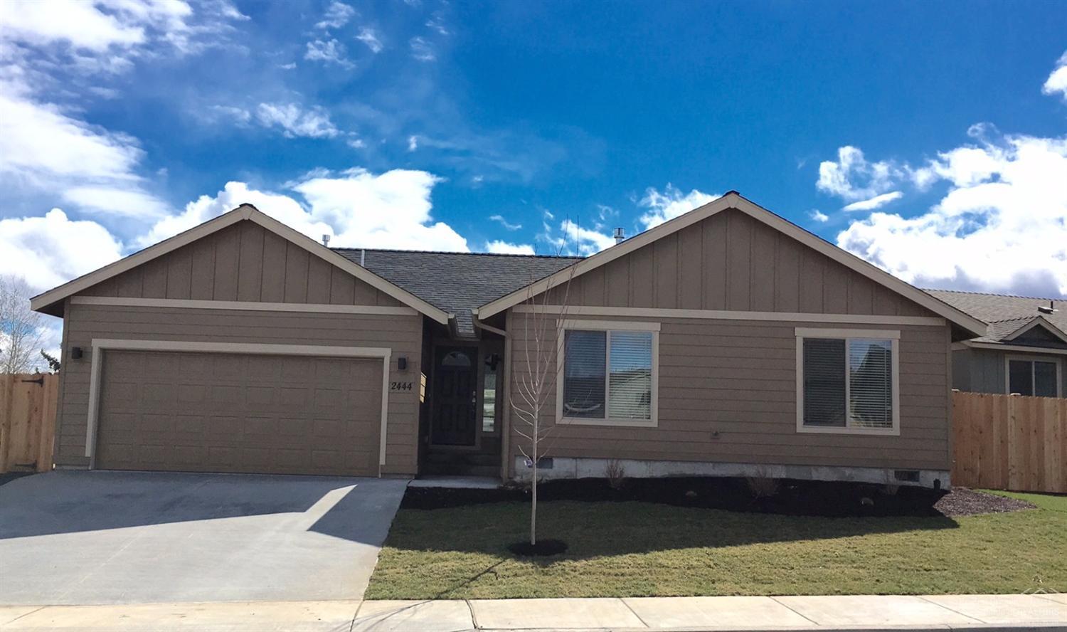 Brand new single level,3 bedrooms, 2 baths with 1511 SF of living space. Home offers a great room with vaulted ceilings, gas fireplace and lots of natural light. Kitchen is spacious with Knotty Alder cabinets, an island and eating bar, stainless steel appliances and a large pantry. Master suite has a large closet with double sinks. Finishes include neutral paint tones, plush carpeting, wood laminate flooring, tile backsplashes and window coverings.Front & rear landscaping with sprinklers & back fencing.