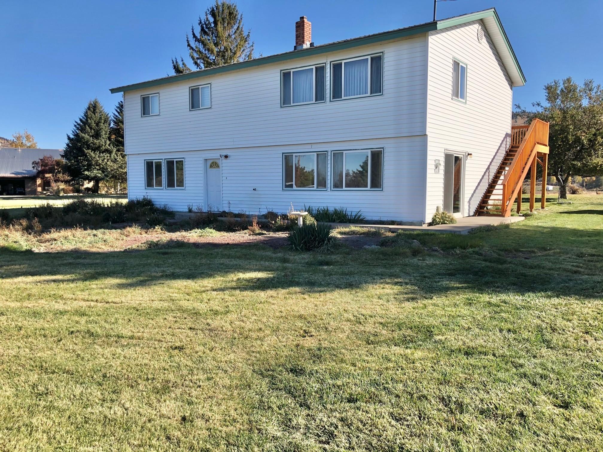 Located in the Henley School District! 1.65 serene, level acres with fruit trees surround this immaculate, single-owner home. Built with love in 1978 and has very obviously been well cared for over the last 40+ years. So many recent updates including interior paint, wood stove and flooring (all 2020), as well as water heater, septic, deck, kitchen cabinets and kitchen counters (all 2019). Custom ordered blinds are on their way as well. The lower level of the home is currently a blank slate and would be the perfect place for a large master bedroom, a rec room, a few bedrooms, the possibilities are endless... To top it all off, the entire property has KID A water rights. You don't want to miss this one. Book your showing today!