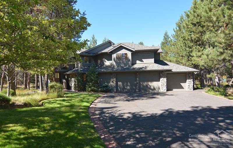 Sunriver Big Deschutes River view home with over 3100 sq ft of living space, 4 bedrooms, 3 master suites, 4.5 bathrooms, open vaulted great room, wall of windows over looking the pine trees and the Deschutes river. River rock fireplace in the great room and family room, oversized 3 car garage, over 1000 sq ft of decking, over 500 ft of pavers, over 3000 sq ft of parking space. Located at the end of Blue Grouse Lane. Come see what this home has to offer.