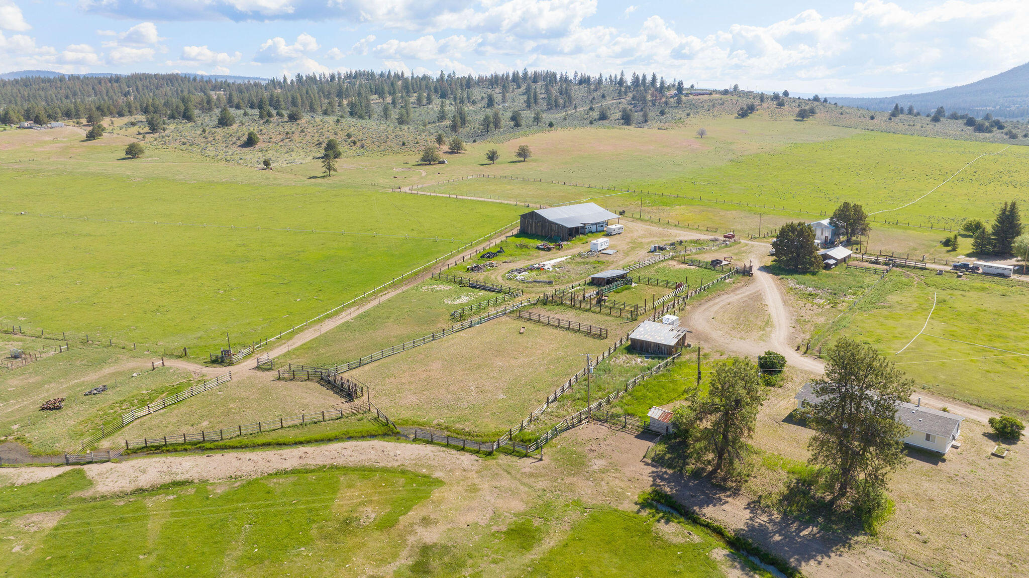 Located in Southern Oregon in the rural community of Beatty, along the Sprague River Valley, lies a peaceful cattle ranch that could be perfect for you & your family for generations to come. This incredible piece of ground could be a small year-round cattle ranch, a summer ranch for cow/calf pairs or yearlings, or could be farmed up to make an excellent hay production operation. Of the 324 total deeded acres, there are 286 acres of irrigation. These irrigated acres are from groundwater rights delivered from 2 strong wells. Groundwater rights are fantastic & some of the best irrigation rights you can acquire. Fenced & cross-fenced into numerous pastures, this place runs very well with intense grazing rotations, making this ranch a powerhouse of production & grazing outputs. Improvements include 2 homes, each offering 3 beds/2 baths. With a nice shop, working corrals, leadup & squeeze chute, & hayshed, all the hard work and basics of and basics of an excellent cattle operation are here.