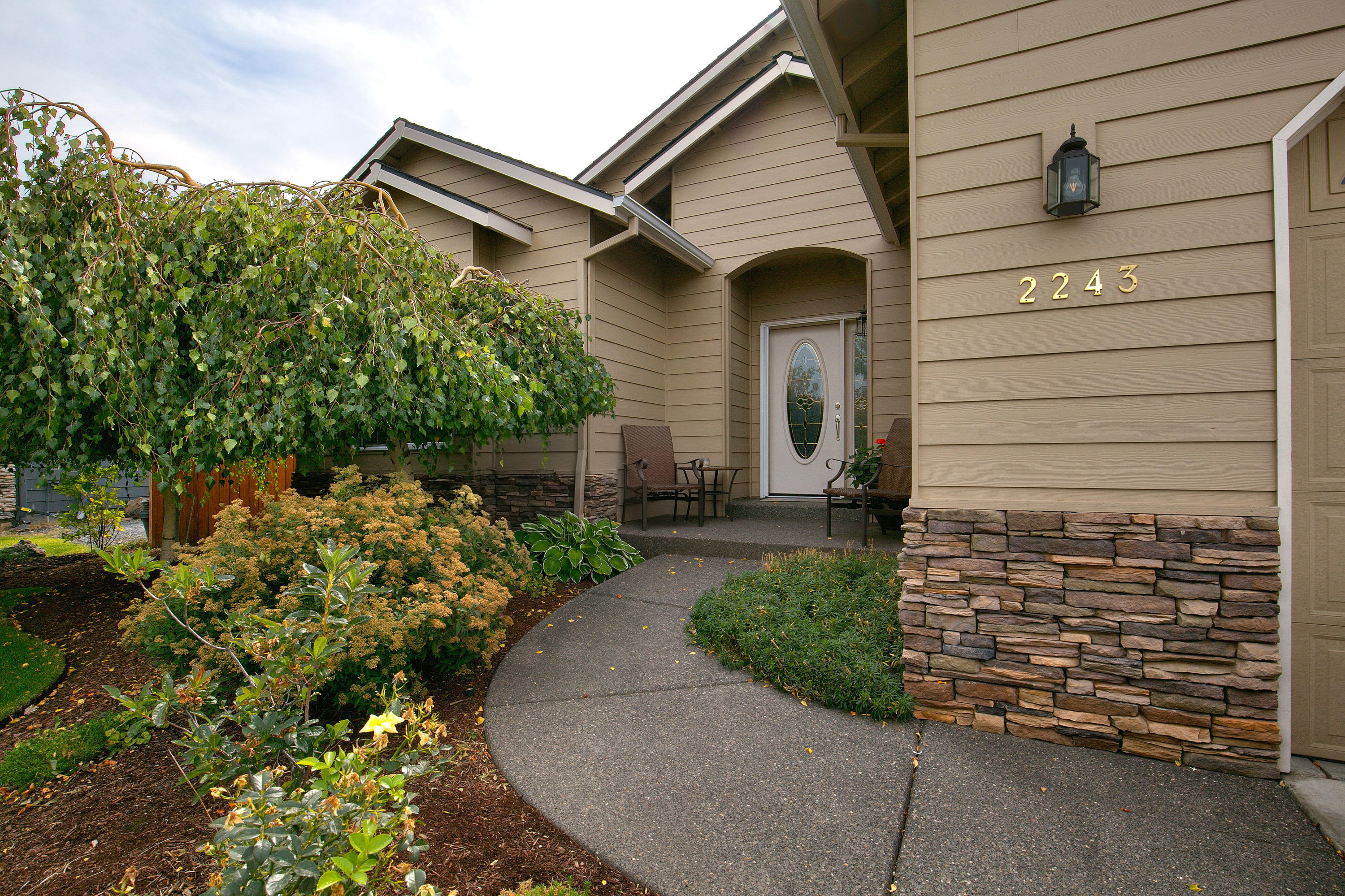 Charming single level home just minutes from downtown, shopping, parks, and the hospital. Open floor plan with inviting great room with a gas fireplace, large eating bar, and kitchen. Quality finishes throughout this thoughtfully designed home. The covered patio adjoins the lovingly landscaped and fenced yard. Please do not disturb occupants. Showings by appointment only.