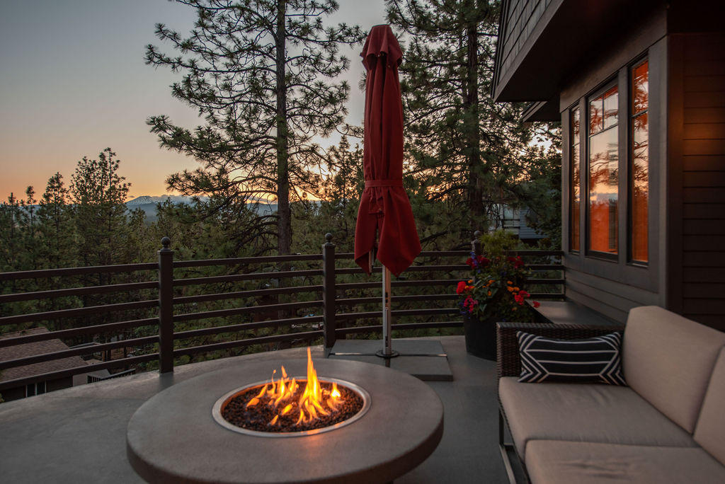 We refer to this rare find as the ''Zen Treehouse'' and once inside, you'll know why! The current owners, with a discerning eye for creativity and design, have transformed this home into a true experience with beauty, peace and tranquility in mind. Custom built in 2003, this home has been completely revitalized & rejuvenated with top of the line finishes throughout. Solid fir wood wrapped metal clad windows and doors, Hubbardton Forge lighting, a mix of hardwood, heated tile, cork flooring throughout. Don't miss the custom sauna on the lower deck! 3 bedrooms, 2.5 baths, a den, and a 198 sq ft separate Artist's Studio  (not included in home sq ft.) Situated on a .31 acre lot in the desirable West Hills, the home has two metal framed, coated concrete patios with Mt Bachelor and city views. There are too many design details to list here. Be sure to look for the specifics in the photos and video, or better yet, come experience it for yourself.