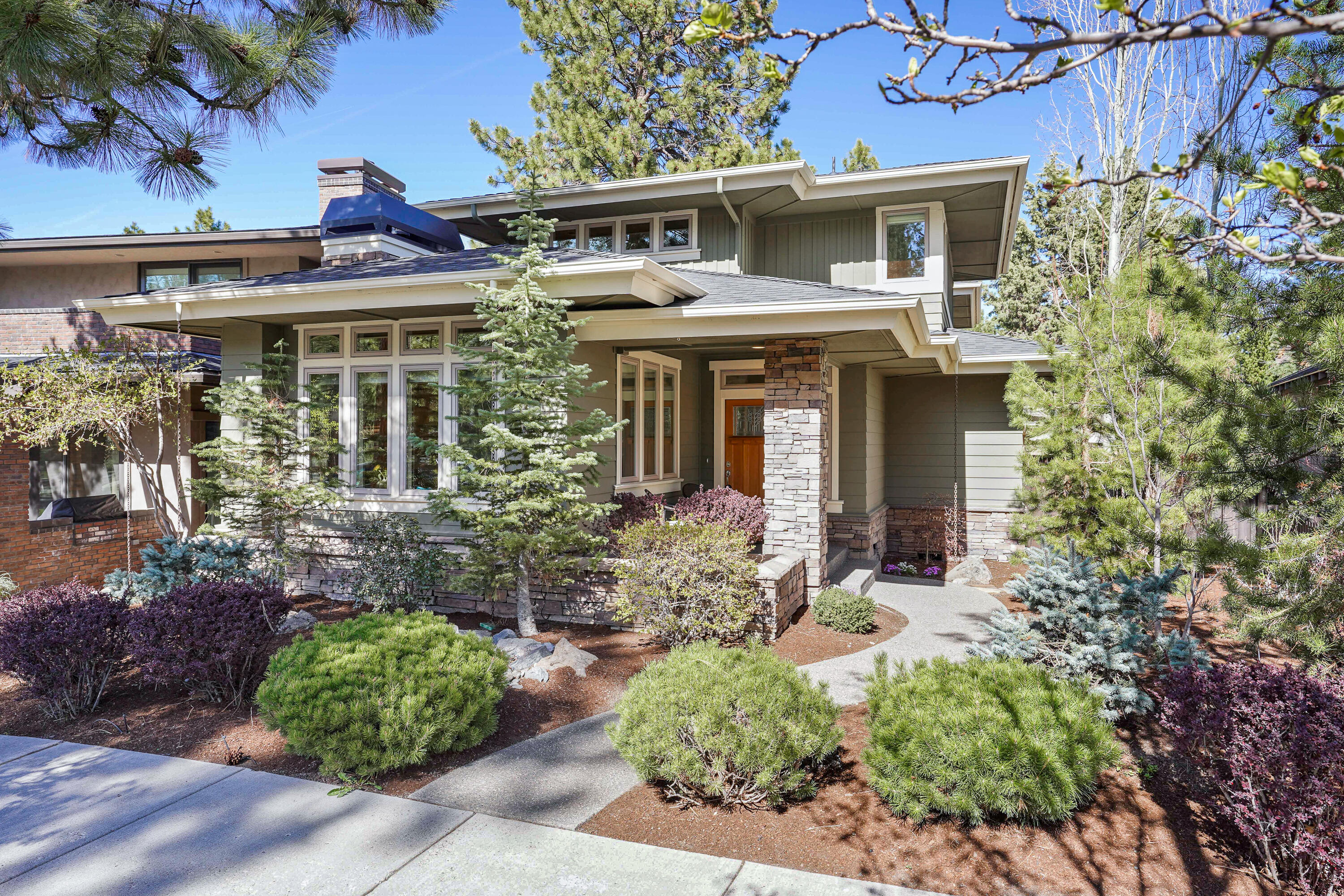 What's not to love about this contemporary Prairie Style home located across the street from Compass Park and close to the shops, restaurants and all that the Northwest Crossing neighborhood has to offer. Attention to detail abounds from the mature, low maintenance landscaping complete with water features to the new white oak flooring and linear fireplace with quartz mantel and hearth in the living areas and the sparkling updated kitchen and appliances. Upstairs are all 3 bedrooms, each with California Closet shelving and new carpeting throughout. The primary bath has been remodeled and includes an inviting stand alone soaking tub. Please put this one on your list. Open houses Fri/Sat/Sun May 5-8th from 12-3pm.
