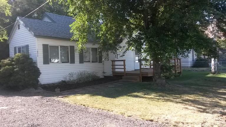 Great property in Prineville. 3 bed, 2 bath close to schools including the new grade school. Also close to the new St. Charles medical facility scheduled to open late summer/fall 2015. Besides location, this home has a total of .96 of an acre with over 1/2 an acre available for shop, barn or future development. Home has been remodeled with new flooring, paint, bathroom fixtures, pine accents & more. Large garage with entrances at each end & 480 sqft finished area above complete with kitchen and bath.