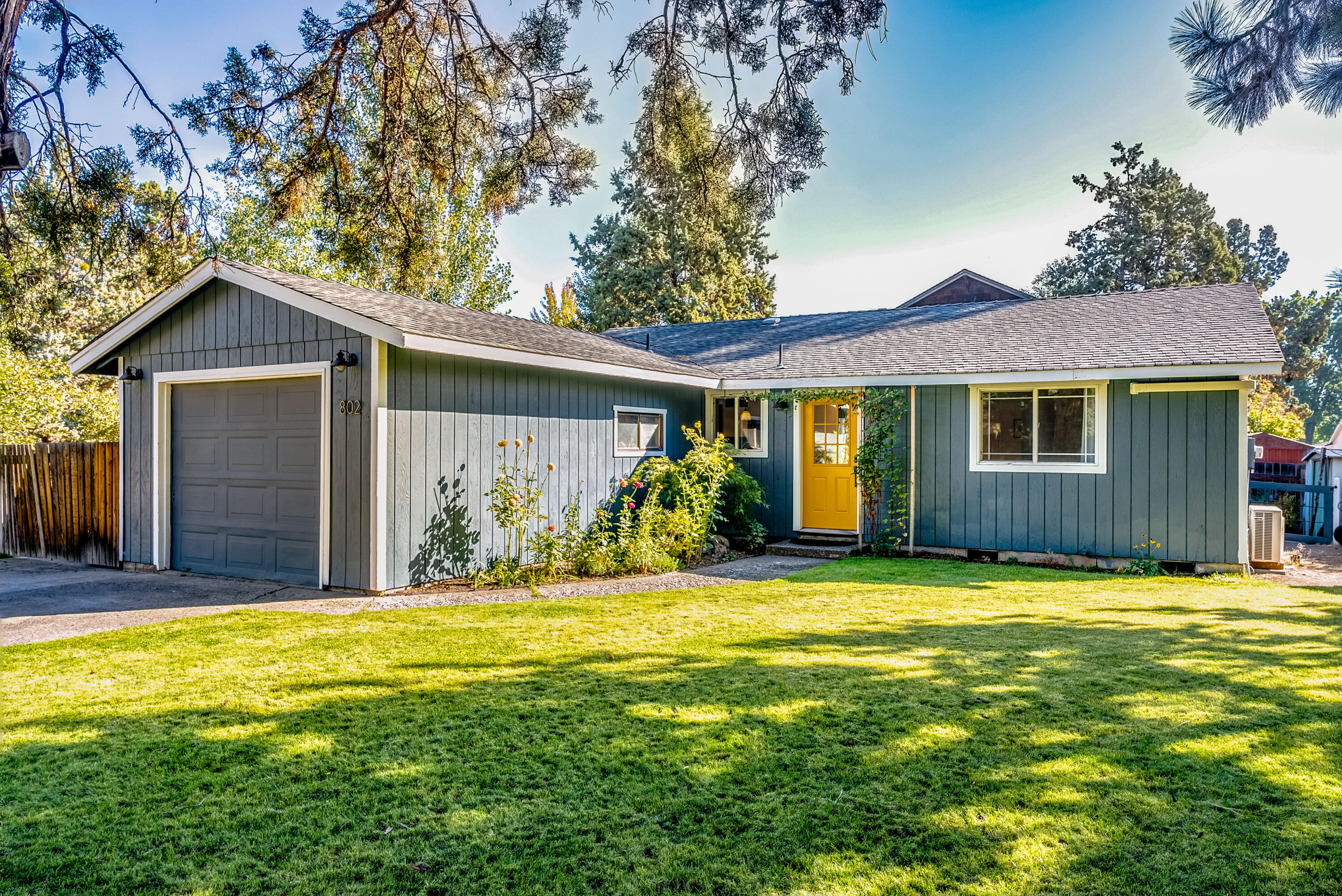 Charming single level ranch style home in SE Bend. This 3 bedroom 1 bath home has been renovated inside and out! Kitchen features concrete countertops and tile backsplash and is open to the dining area and living room. Bathroom remodel is a must see with a tile shower and new vanity with quartz composite countertop that attaches to a primary bedroom as well as to the main house. Home has a woodstove and mini-split for heating and cooling. Close to the baseball games at Vince Genna and shopping and dining at the Old Mill!