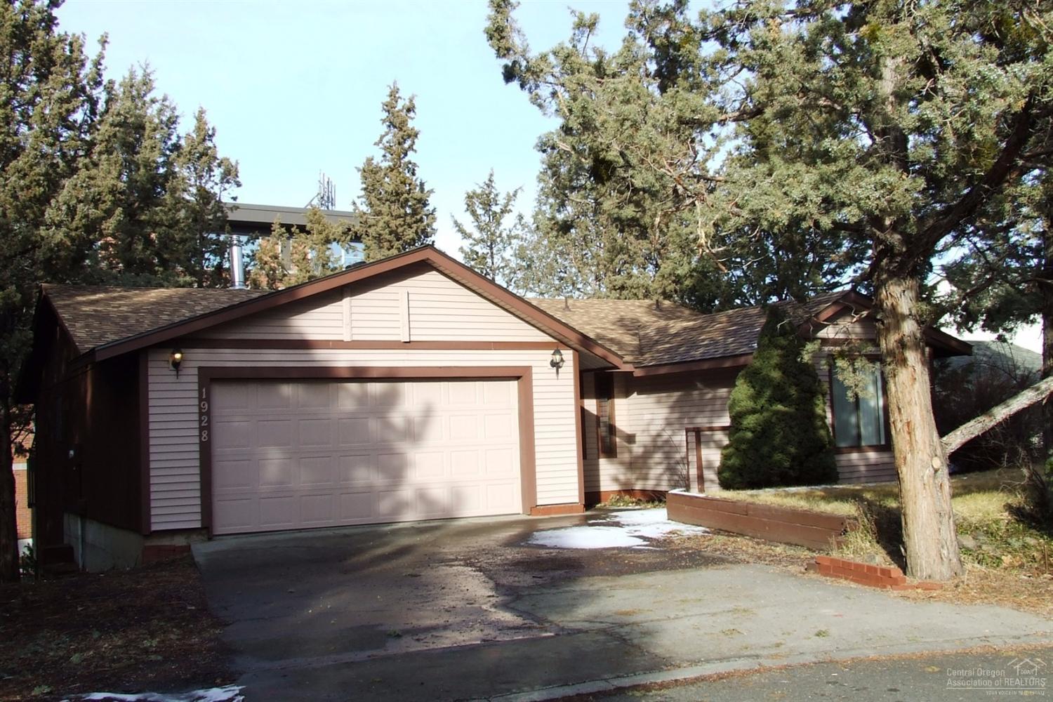 Pride of ownership and value are found in this great NE Bend home. Easy maintenance living, quite cul-de-sac, open living room with efficient gas stove, large deck, newer paint, carpet and roof, finished garage with work area, oversized 8276 sq ft lot, circulating hot water heater, three bedrooms with larger closets all close to parks, schools, medical facilities, shopping and restaurants. Home is vacant and ready to show.