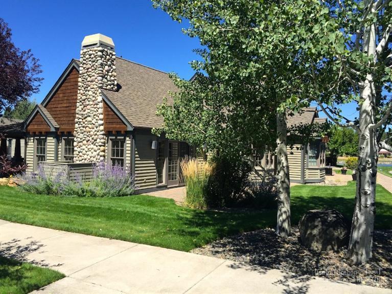 Live the good life in Pine Meadow Village. Located right next to the club house and pool, this condo is a thing of beauty. With a full floor to ceiling river rock fireplace, hardwood floors and tile countertops, this unit is well appointed. Great windows provide tons of natural light. An open floor plan allows for conversation at any part of the unit.