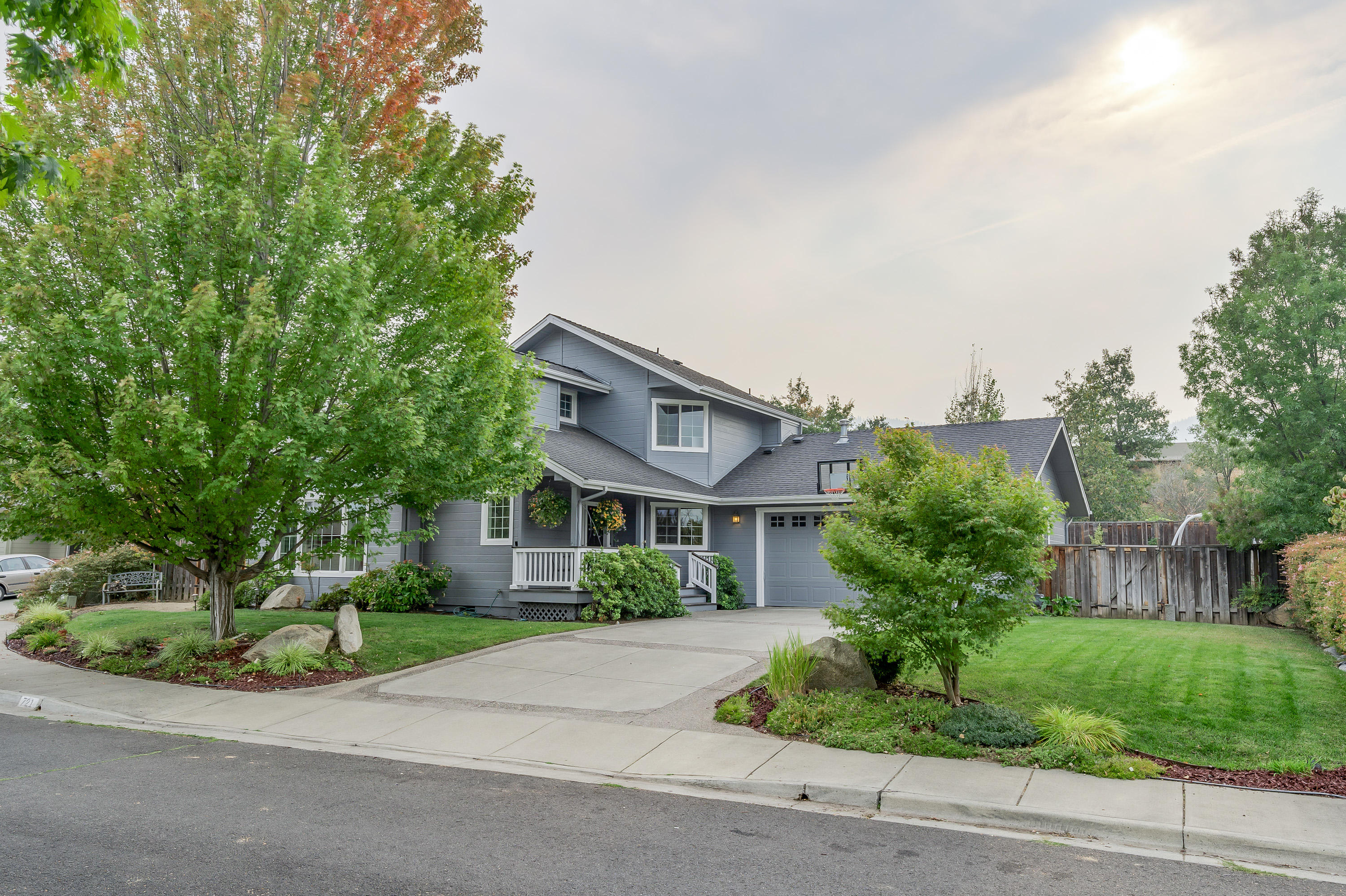 Well maintained home in a nice neighborhood on a cul-de-sac in beautiful Ashland, Oregon. Great floor plan with the master bedroom suite on the main level and two additional bedrooms with a shared bath located upstairs. Living room has a cozy wood burning fireplace, tall ceilings with architectural lines and lots of windows to allow for natural light. Well laid out kitchen with an eating bar. Dining room has access to the back yard. Upgrades completed in 2020 include a complete kitchen remodel including smart stainless-steel appliances, home was professionally painted inside and out and new carpets were installed. Many ''Smart'' features in the home, including lighting, thermostats, sprinklers, just to name a few. .19 of an acre lot allows for a nice sized yard, a mixture of lawns and hardscape with two pond water features. This is a nice place and is ready for the next owner to enjoy!