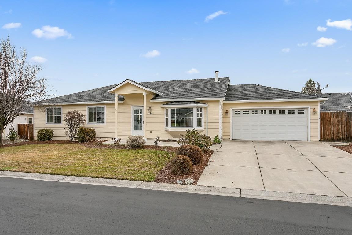 Desirable Oak Valley 55+ residential community in beautiful small town Talent. Well cared for 3 bedroom, 2 bath home features vaulted ceilings, with an open great room floor plan, large functional kitchen with pantry, breakfast bar & dining area. Oversized master bedroom with slider to the patio, walk-in closet & master bath with double sinks. Garage is 24 ft. deep for full-size long bed trucks, with built-in workbench & lots of storage. Very low maintenance yard, fabulous clubhouse/pool for your neighborhood and/or family activities.