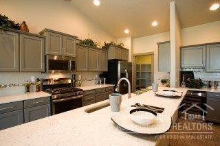 Breathtaking Cascade Mtn views await at this Hayden Home community, Cascade Heights. Open concept living with built in desk, Quartz kitchen counters, wood laminate flooring in kitchen/dining, SS appliances, A/C, fenced, completely landscaped, gutters, covered patio, 4' garage extension, & beautiful exterior with masonry and full lap siding. Master suite-dual vanity bathroom, soaker tub, walk in shower & closet. 3 beds + Office. Includes free Washer/Dryer, Fridge. Pics of similar home. Est. February move in