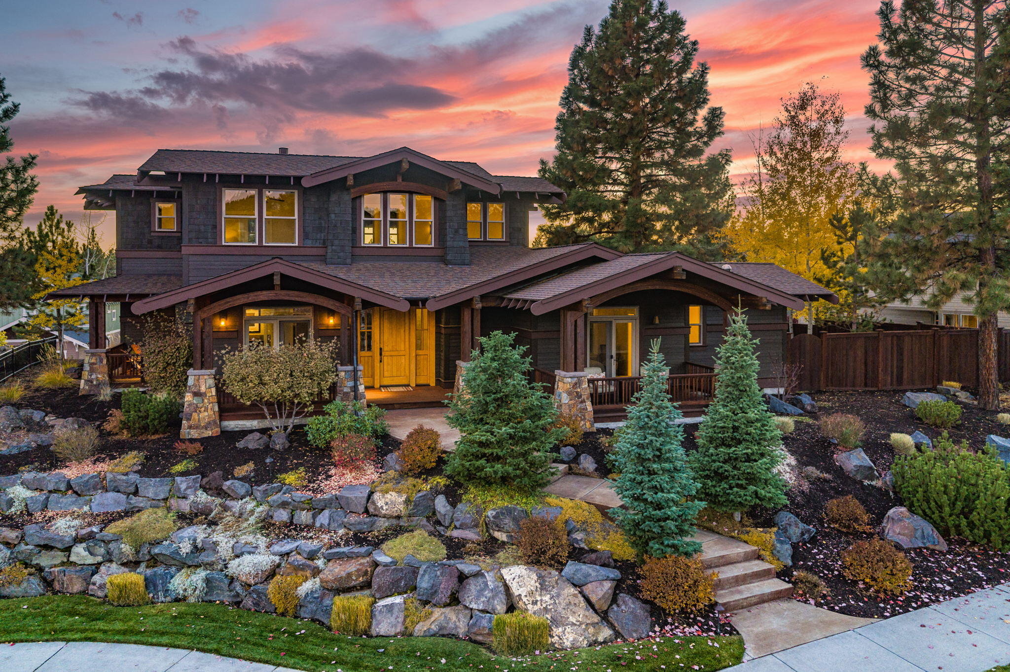 A rare opportunity to own an exquisite home located in the heart of the most sought-after community in Bend, North West Crossing. At the end of a quiet oversized cul-de-sac, you'll find one of the top custom-built homes throughout Central Oregon. No expense was spared in the quality and craftsmanship constructed throughout every detail of the build. Featuring arched ceilings, hickory hardwood floors, two fireplaces, a gourmet kitchen with concrete counter tops, a formal dining room, wet bar, wine closet w/cork flooring, two master suites, a smart home system, built-in speakers, five custom mahogany decks, an oversized exterior patio, gas fire pit, outdoor kitchen, and a putting green. Upstairs are three bedrooms including the master suite with mountain views, a hot tub, bonus room, and laundry room. The three-car garage features newly epoxied floors, with a built-in workbench. Walking distance to walking/biking trails, parks, restaurants, and a short drive to skiing at Mt. Bachelor.