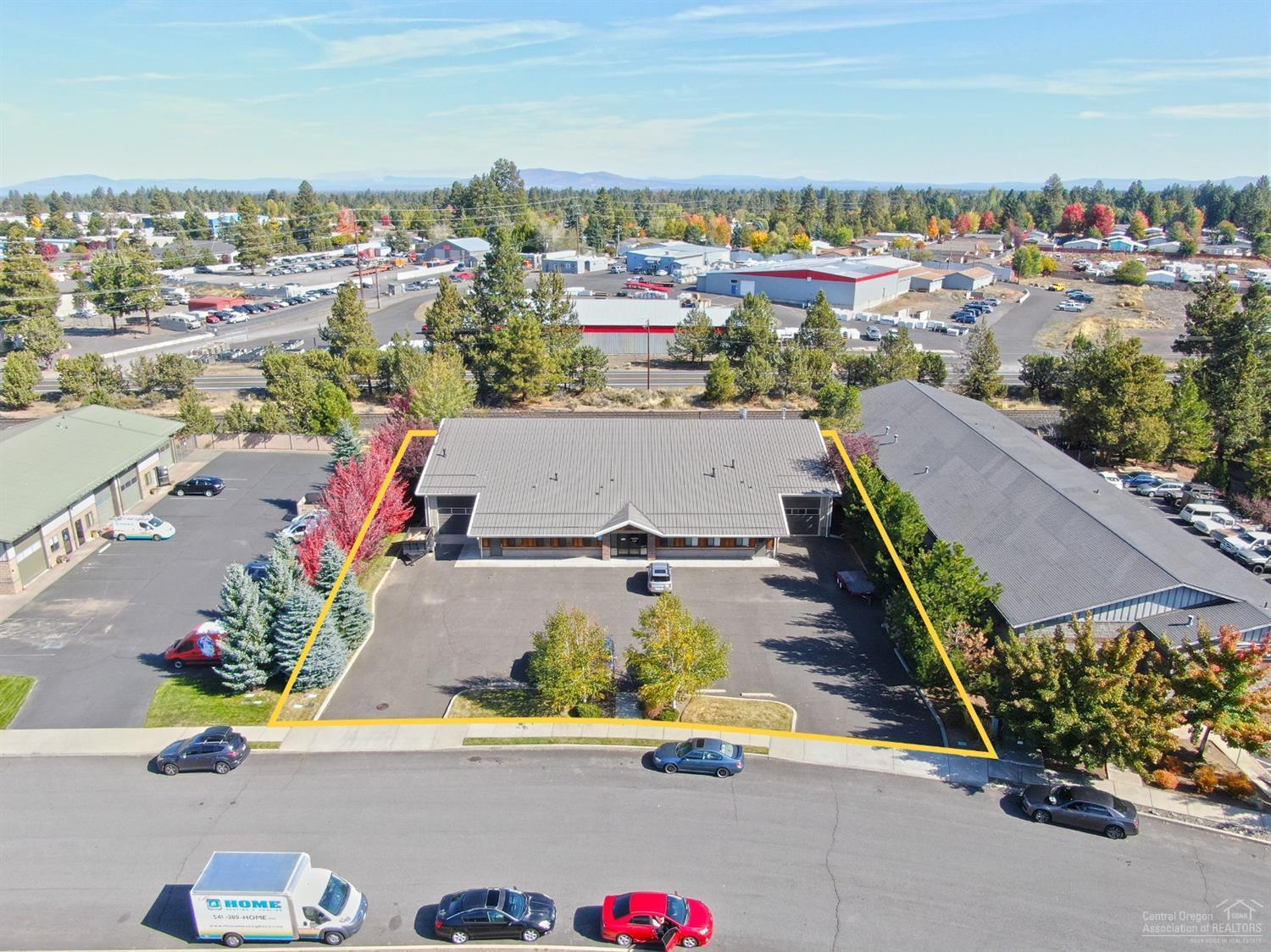 Quality industiral building in SE Bend.  Custom built as woodworking shop.  Professional showroom space and office in front part of the building.  Remaining space is clear span shop area with demised paint booth, shop offices, and break room.  Plenty of power.  Owners business fixtures and equipment could also be purchased, but is not required to be a part of the transaction.