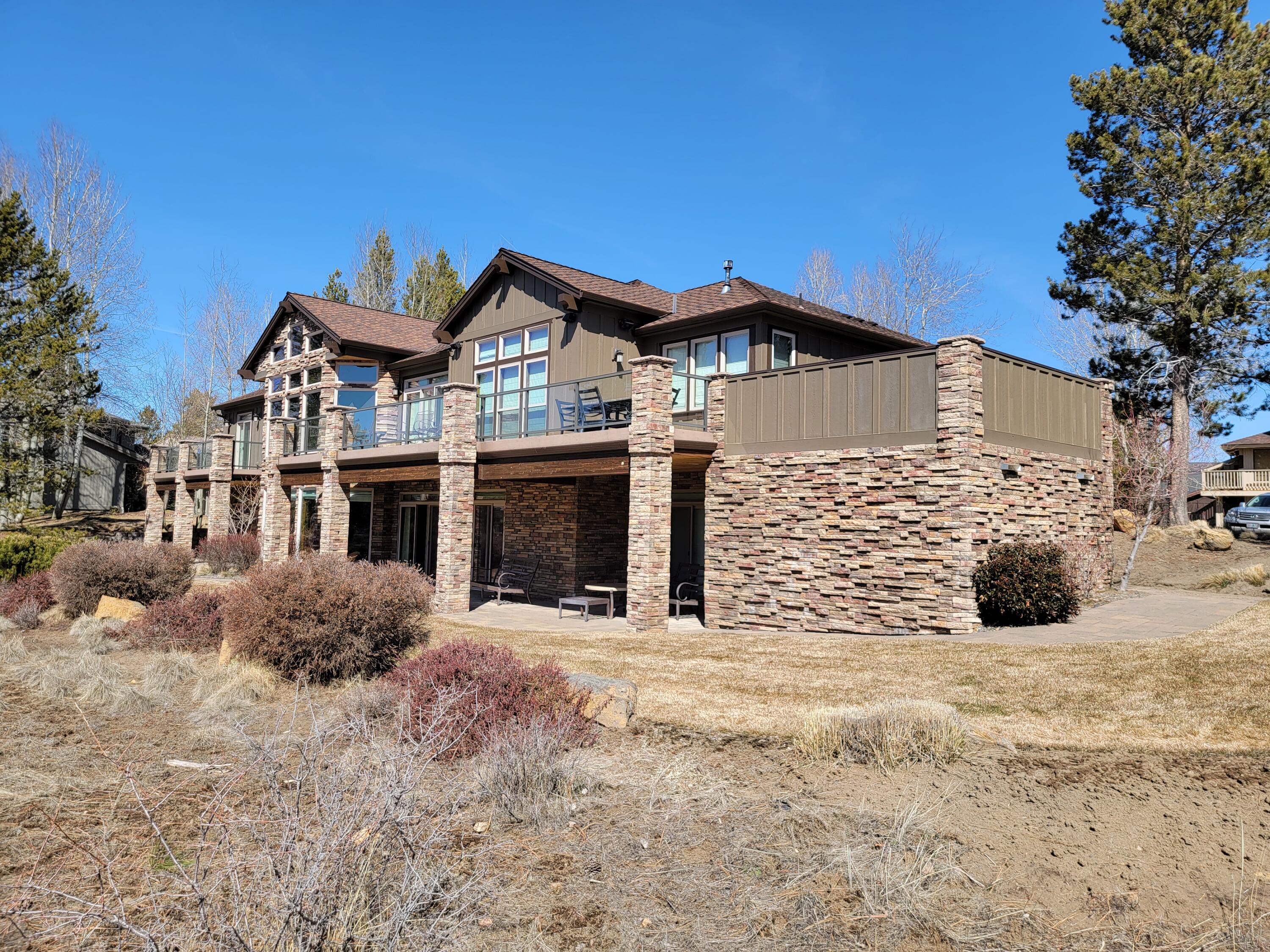 One of Sunriver's finest homes! Over 5100 feet of luxury living overlooking the pond and the 9th hole of the Woodlands Course. 5 bedrooms / 5.5 baths + den with a sophisticated lodge feel. Separate living and family areas with tons of room for entertaining. Multi level Trex and concrete paver decks take in the spectacular water and golf course views. 3 fireplaces and many custom features makes this home truly like no other in Sunriver! Most furnishings are negotiable.