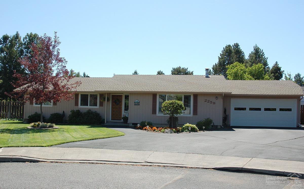 Charming Single Story Rancher, clean as a whistle and lives large with open rooms! Thoughtfully cared for over the years, great floor plan, re-designed kitchen with ample pantry and counter, gas freestanding stove on hearth in main room, master has private bath. You'll love the central location close to shopping, eateries and medical, larger lot on cul-de-sac with RV parking and hook-up, outdoor storage, and fenced backyard with garden space. Garage attached to home for easy access.