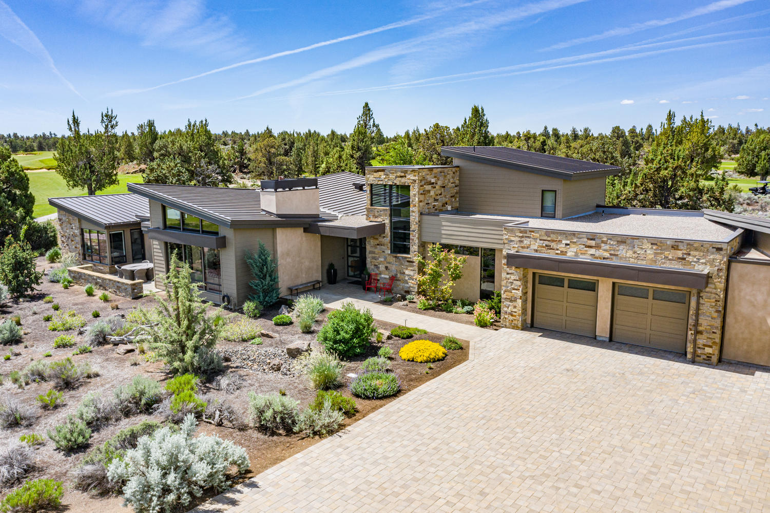 Modern Elegance at Pronghorn.... This home embraces views of the coveted Fazio 12th and 13th fairways and acres of surrounding privacy within the Resort. Enjoy open and light living in this Northwest masterpiece built by BendTrend. 4100 square feet of main level living includes the master suite, great room, amazing chef's kitchen, guest suites, den/office and outdoor living spaces. An additional 500 sq ft Bonus / Media Room is located on the 2nd level, featuring amazing sound and visual space. Don't miss the oversized 1500 sq ft garage! Lots of built in storage cabinetry, workbench, and a 10' door for RV/Boat storage and all your gear for the Central Oregon lifestyle. Relish in all the amenities Pronghorn offers...Gated Community, Dining options, Resort Spa, 2 Golf Courses rated in the Oregon Top 10, Pools, Fitness Center, Dog Park, Concierge Services, and more...
A full Pronghorn Premier Club Membership is included.