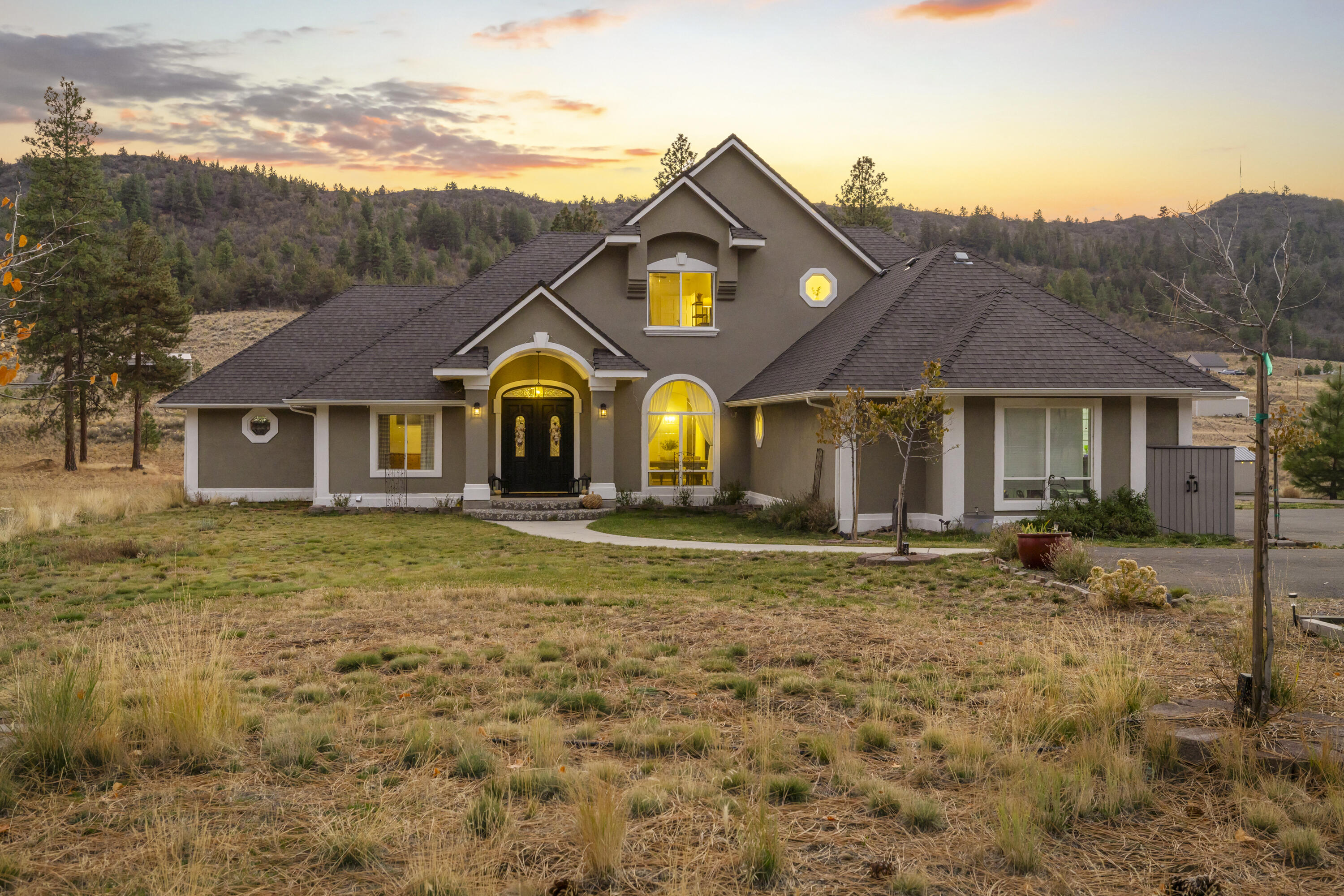 Luxury Meets Tranquility.
Discover refined living on 4.26 private acres in one of North Klamath Falls' premier locations. This beautifully upgraded estate blends modern elegance and natural serenity, offering spacious interiors, high-end finishes, and resort-style comfort just minutes from OIT, Sky Lakes Hospital, and town amenities. The fully finished 1,836 sq. ft. lower level includes a private entrance, garage, and full amenities—ideal for guest quarters, luxury rental, or multigenerational living. Outside, enjoy a picturesque pond with dock and gazebo, perfect for relaxation or entertaining. A rare opportunity to own a luxury retreat combining comfort, privacy, and timeless appeal.
