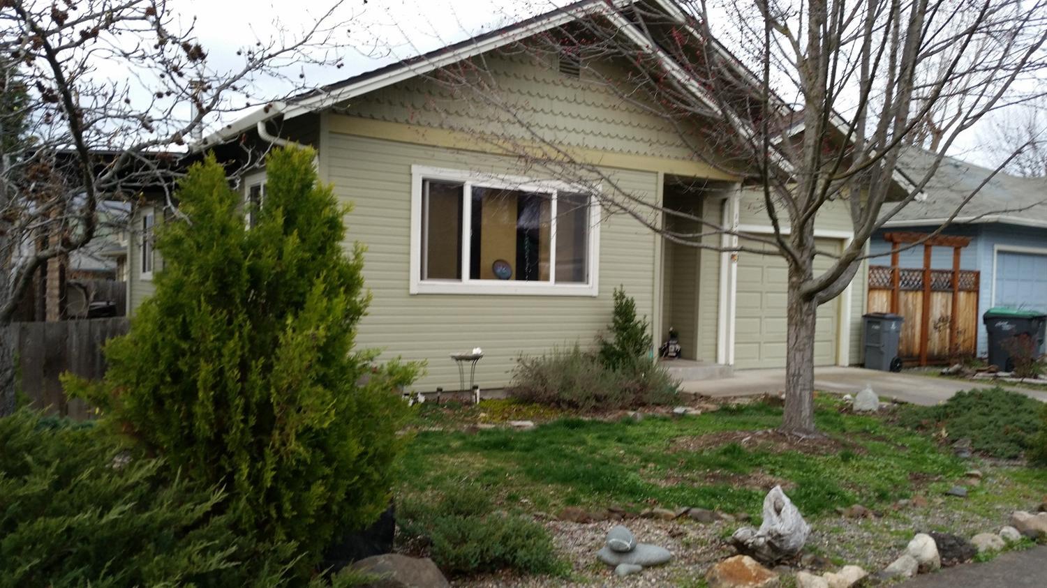 Cute two bedroom, single level home with vaulted ceilings, is blocks from downtown, and conveniently located near schools, shopping. This home has been well maintained, and has an outdoor eating area, and garden area in the back yard. Small, yet efficient, and perfect for the first time homebuyer, or someone wanting to downsize in a single level home that's easy care.