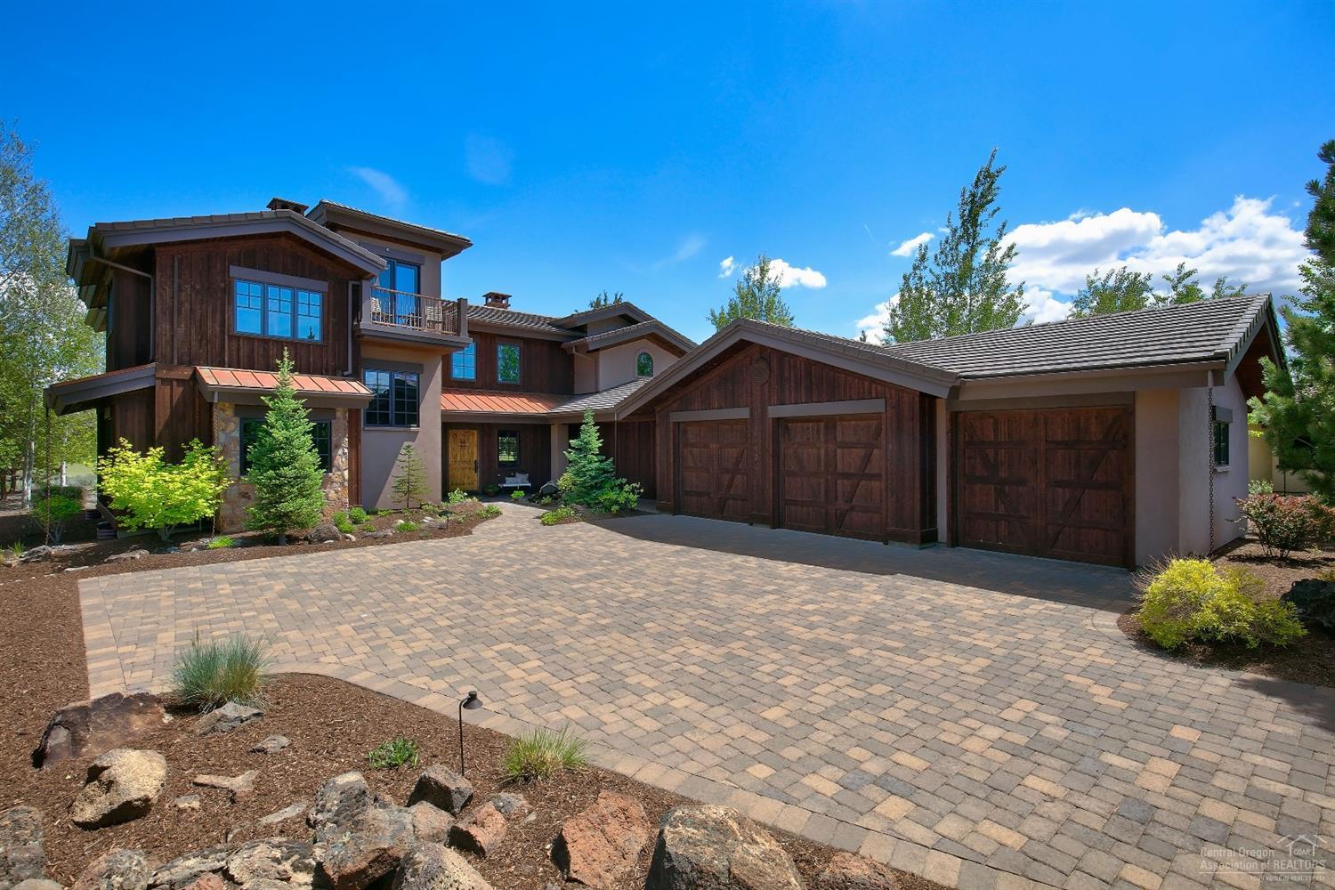 Tranquil views from this timeless NW Contemporary home in Pronghorn. Located on the Nicklaus Signature Fairway #5, views of the Golf Course and acres of BLM land in front of you. High end finishes, Chef's kitchen, distressed wide plank floors throughout, 3 En Suites & a 4th Bedroom & Bath. Towering stone Fireplace, Large loft with views and deck. Master suite w/Fireplace & spacious Bath. All Furnishings included. A Pronghorn Premier Club Membership Included! This is Turn Key! Don't miss this opportunity!