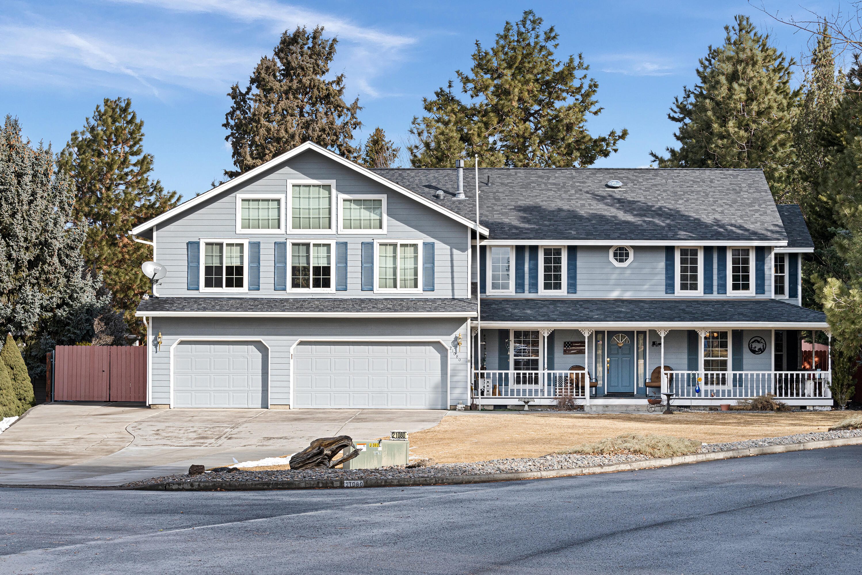 This traditional four bedroom home sits on nearly a half acre in SE Bend and affords easy access to shopping, restaurants and medical facilities. This home features a living room, office, family room w/certified woodstove, a  spacious kitchen with updated granite counters and an eating area in addition to a formal dining room. All bedrooms are upstairs and the primary bath has a tub, shower and dual vanities. A 1,200 sf bonus room with added in 2004 and features a gas stove with a river rock backdrop, a wet bar, a loft area and small deck with outside access. The huge 1,216 sf garage with workshop area can easily accommodate 4 cars with room to spare. Both the front and backyards are landscaped and have irrigation systems. The fenced backyard has RV parking with concrete pad, a storage building and wood storage shed. There are mountain views from the upstairs bonus room. Don't miss this wonderful home contact your Realtor to schedule an appointment.