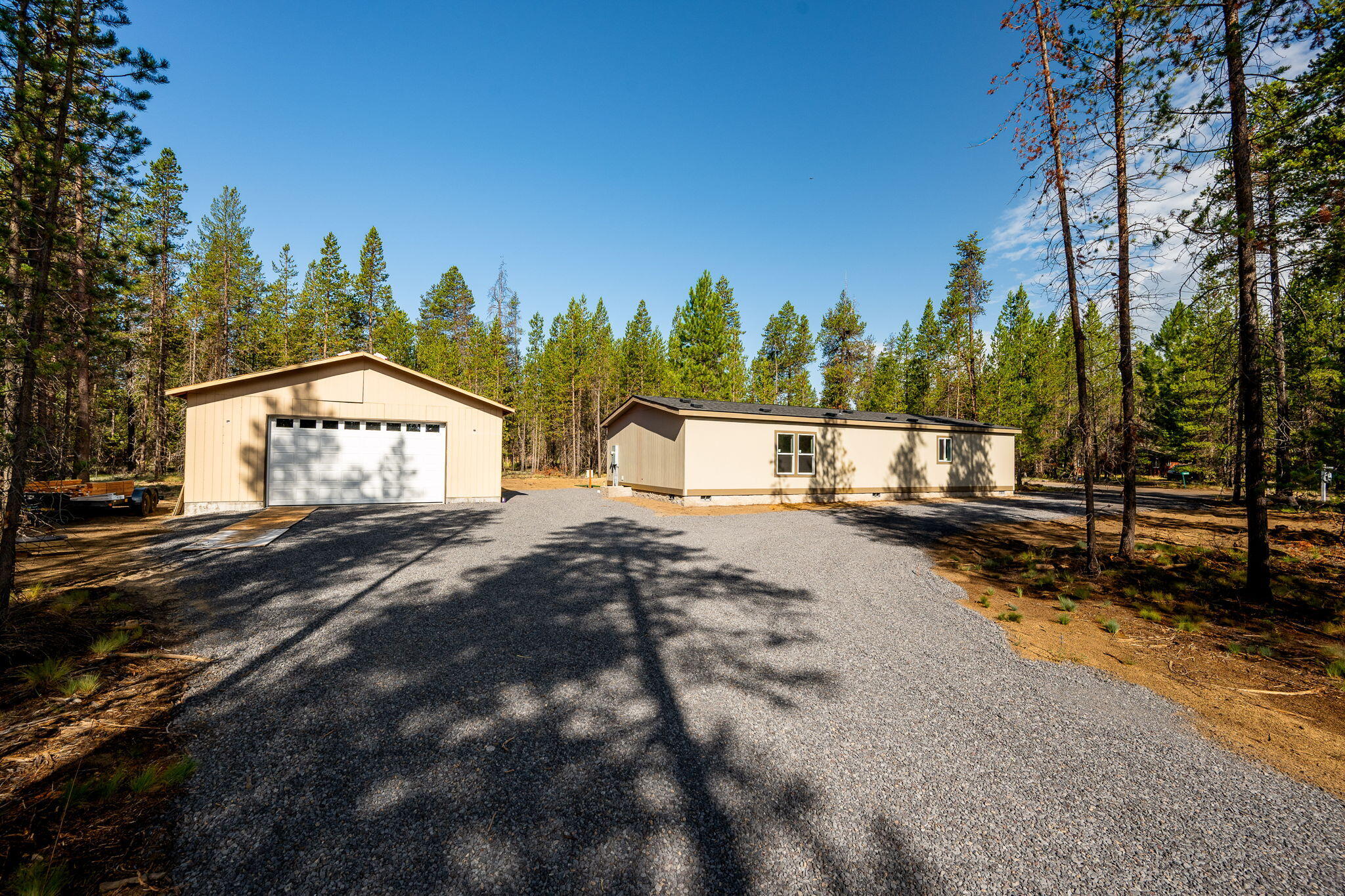 Brand new home and oversized garage on an acre lot with trees surrounding. Safari Acres does not have any CCRs or HOA.

The home features an open floor plan, kitchen island, spacious pantry, a large primary suite with walk in closet, LVP everywhere but the bedrooms and it's just waiting for you to make your finishing touches. 

The property features a brand new well, new ATT septic system, and a 28'x36' garage. 

Tucked off of Burgess, enjoy easy access just blocks off the beaten path in a quiet corner of La Pine.