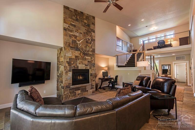 Elegant 3 Bedroom Widgi Creek townhome seamlessly blends warm & cozy with sleek sophistication. Fully furnished & updated home features an open great room with floor to ceiling rock fireplace, slate and wood flooring, an updated gourmet kitchen, complete with high-end appliances including Viking refrigerator, new dishwasher, composite sink and stainless-steel counters. An open staircase with high tech cable railing leads to spacious loft office with lovely golf course and pine tree views. The combination of two master suites and a full en-suite guest room along with the prime location just minutes from the slopes of Mt Bachelor, a short walk to the Deschutes River and Golf literally out your back door, make this the perfect full-time residence or home-away-from home that can be rented as a long or short-term vacation rental when you are away