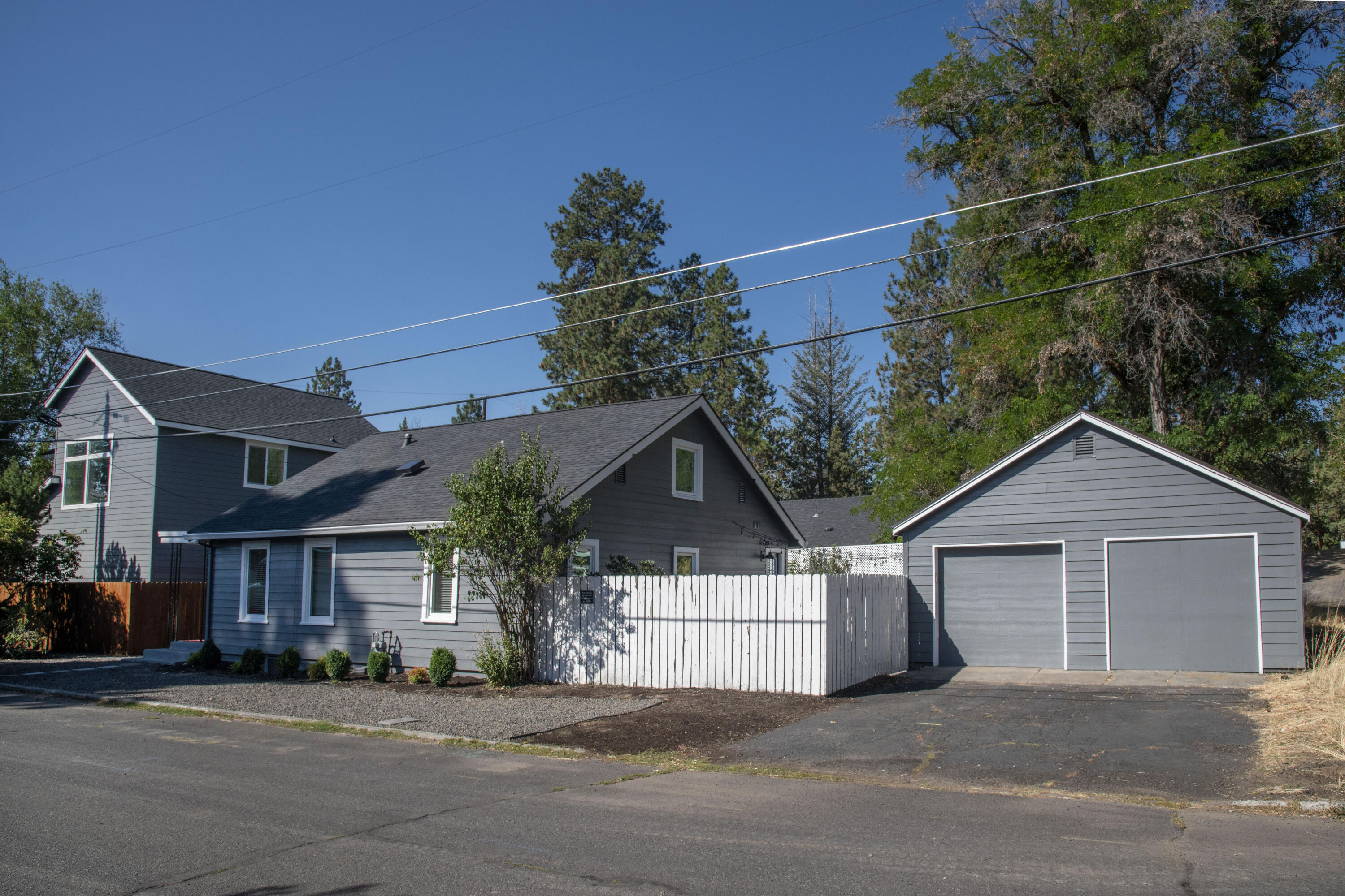 Darling 4 bd/2 bath turn key home plus new 800 sq ft. ADU in a fantastic NW Bend location!  No common walls or common space. Both yards are fenced for privacy.
Just a short walk to the First Street Rapids Park and new pedestrian path into Downtown!  Main house has a back fenced lot with detached garage.

 Flexible use options for full-time living, guest accommodation, income generating or multi generational.
 Easy access to trails, downtown, shops and restaurants.  The home went through a complete remodel in 2020 and the home and garage was re-sided in 2025.  
The newly completed  ADU is a beautiful 1-bedroom, 1-bath,  800 sq detached unit with two car garage and large deck .  A must see property!
Owner is the  selling agent