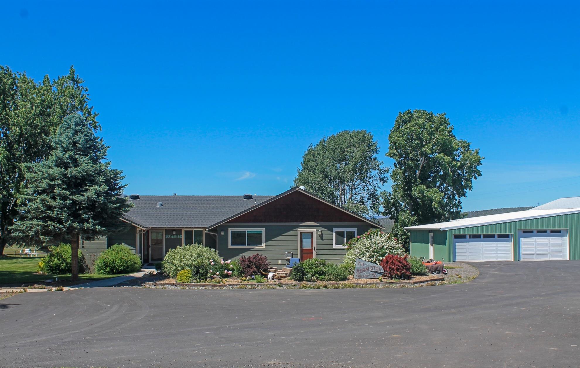 Beautifully updated home on 14.66 acres w/13 irrigated acres, set up for easy maintenance with 2 wheel lines & k line, fenced and cross fenced with an alley from front to back pastures. Stunning views of the Cascades and Smith Rocks. Open great room with stacked rock accents, gorgeous kitchen with huge island, master suite w/steam
shower, in-law suite with fireplace, bonus room w/fireplace currently used as a bedroom, huge laundry room & mudroom. Detached 3 car garage, barn, loafing sheds &
chicken coop, 30 x 30 shop w/3 stalls off the back, full RV hookup, paved driveway.