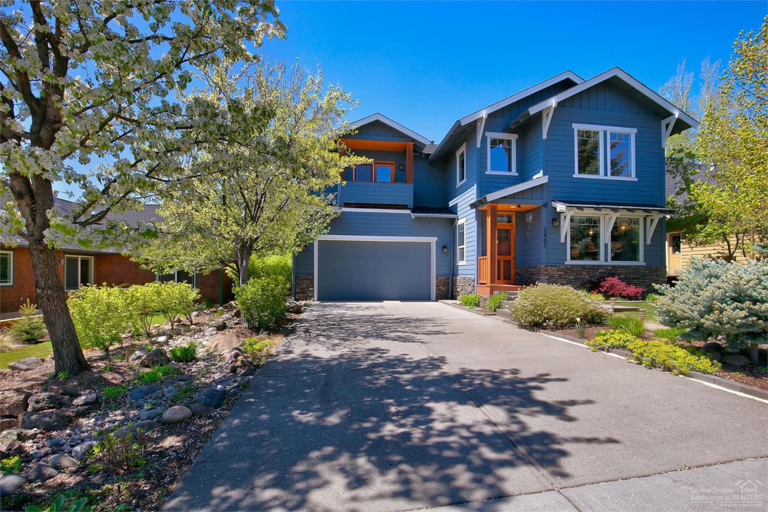 Beautifully updated contemporary home in Northwest Bend! Grand vaulted ceilings make this home light and bright with gorgeous gas fireplace w/Peruvian Walnut mantle, Claro Walnut bar and desk tops, stainless steel appliances, slab granite, hardwood floors and new carpet. Large master suite w/vaulted ceilings, walk in closet, master bath & private balcony. Enjoy the backyard oasis with large back patio, fire pit and stunning water feature including pond with fish. Don't miss out on this home!