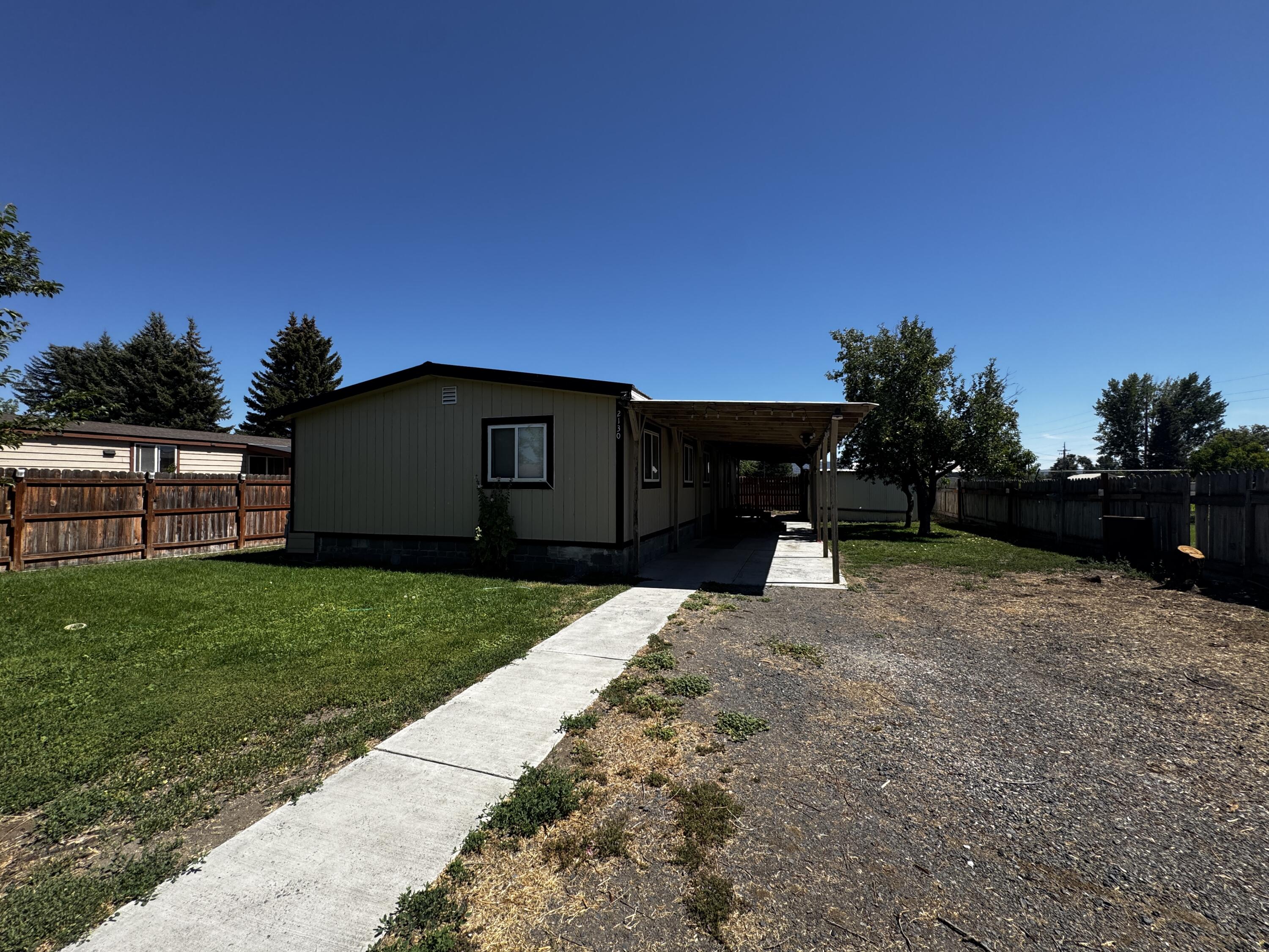 This cozy home is in the wonderful, small town of Malin. This adorable home has a completely fenced yard, mature fruit trees and a covered patio. In the large living room enjoy a large fireplace on those cold winter mornings, or a cup of warm coffee/tea in the breakfast nook. This home boasts 3 bedrooms and 2 full baths and a good sized laundry room! Call today to take a look!