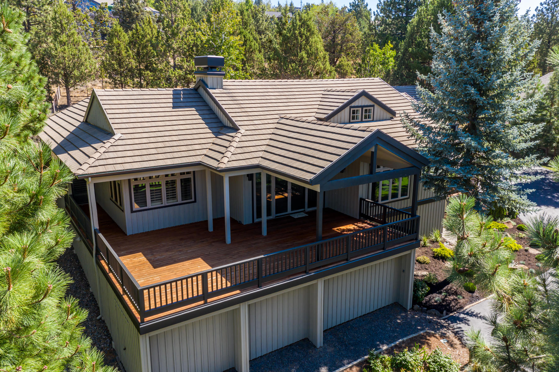 Premium location in Awbrey Butte on highly regarded Starview Drive, this single level, 3010 SF home offers it all. High quality construction by Sun Forest with high-end materials such as concrete tile roof, metal clad wood windows, 3 zone heat & AC, central vac plus over an acre sized lot with a grandfathered fence. Completely remodeled in 2020 w/ contemporary style, including new kitchen appliances, cabinets, quartz counters & butler's pantry. All new interior doors, floor coverings, sinks, plumbing fixtures, light fixtures (interior & exterior), interior paint, exterior trim paint & much more. Great room is accented with beautiful open beam ceiling, rock fireplace with gas fireplace with a large west facing deck capturing the Cascade Mountain Views. Great bedroom separation, level courtyard landscaped with pergola over hot tub. Master suite features private door to deck, dual sinks, soaking tub, oversize tile shower & attached workout/sunroom looking onto courtyard & natural landscap