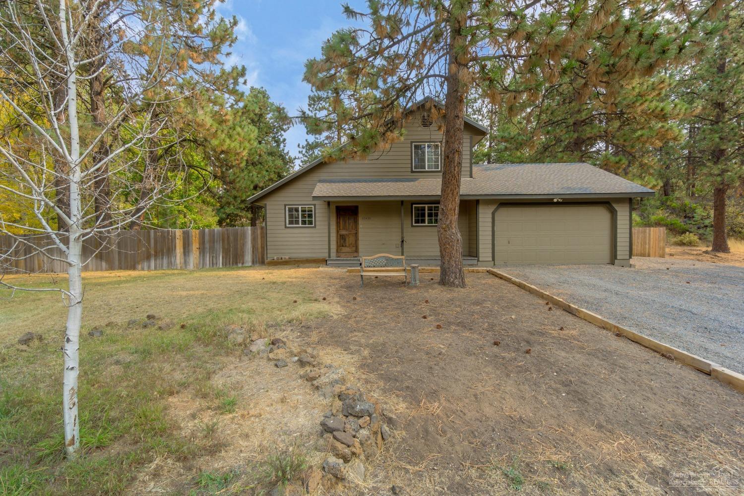 Private, country living close to town! 3bd, 2 ba with 1376sqft and on almost an acre is ready for it's next owner. Vaulted ceilings in the great room featuring a wood burning stove and lots of windows for natural lighting. Laminate flooring thru-out 1st floor. Master on main level w/full bath, 2bd & 1ba upstairs. Large back deck, fully fenced & Landscaped w/front & back sprinkler system. Storage building and plenty of room for your toys! Freshly painted exterior and new roof, must see!