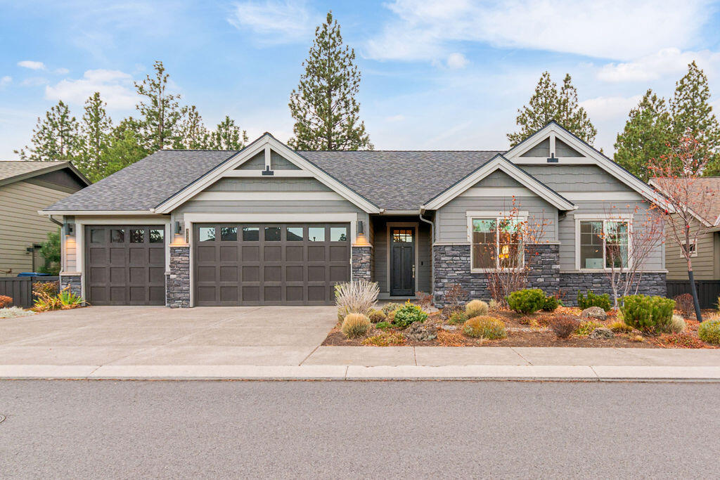 Rare, newer SINGLE LEVEL home backing to golf course in NW Bend for under $1M! This Pahlisch built home is in excellent condition, and offers an abundance of privacy to the rear of the home due to it's relatively obscure location on the golf course. A 3 car garage welcomes you before entering the expansive Great room with vaulted ceilings. A gas FP with stack stone will keep the winter chill at bay, while you prepare a sumptuous meal in the large kitchen surrounded by top of the line Kitchen Aid stainless steel appliances and Quartz kitchen countertops. The foyer is large and inviting, with high architectural ceilings, and the main living area consist of laminate flooring for both look and longevity. Mstr bath offers quartz countertops, a soaking tub and large walk in shower and walk in closet. A small private office w/ sliding barn door puts the finishing touch on this beautiful single level home located in a premier NW Bend neighborhood. WA/DR/ & Kitchen Aid refrigerator included!