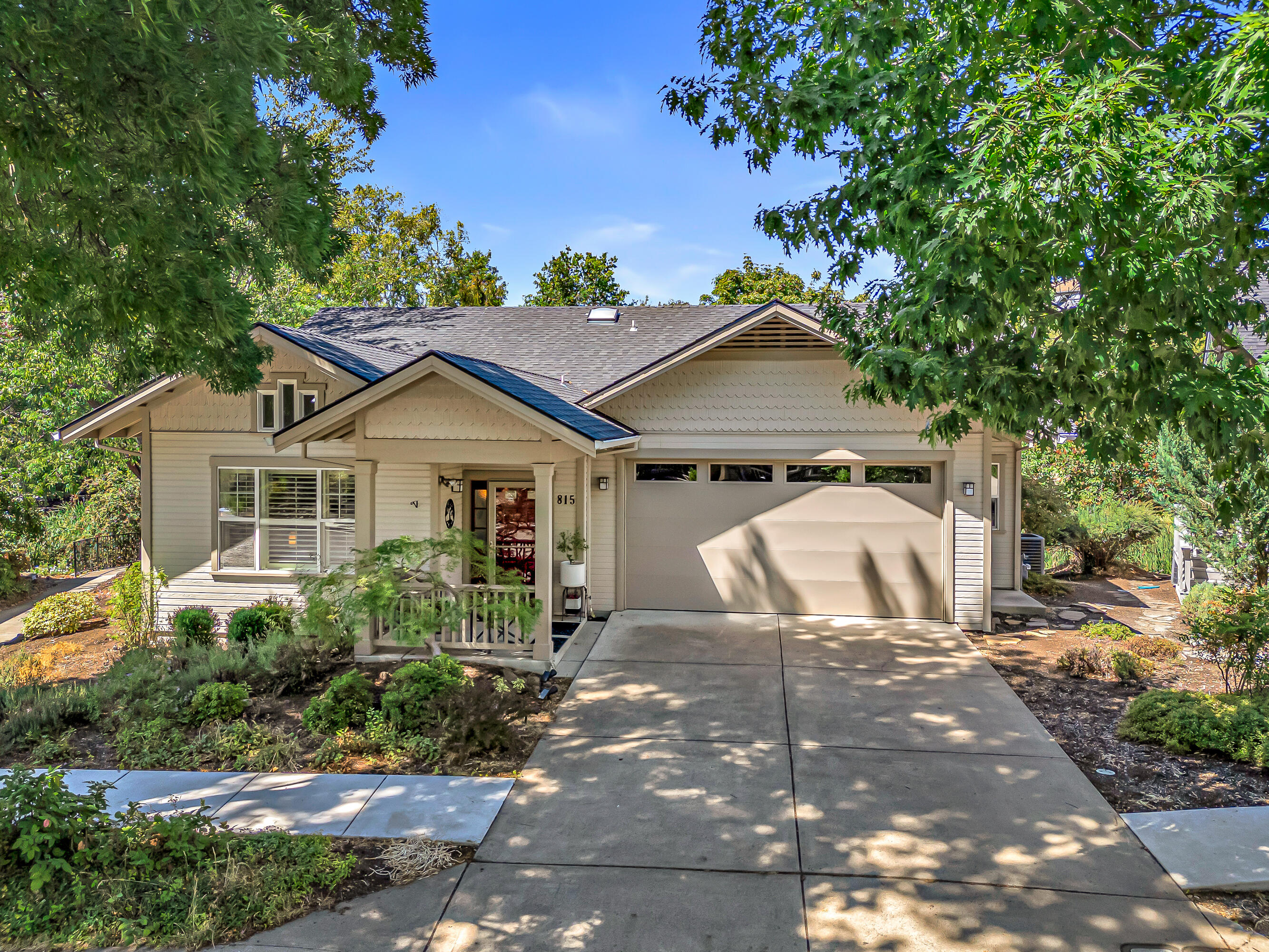 Discover the perfect blend of comfort and culture in Ashland's sought-after Mountain Meadows community. This light-filled, beautifully maintained home offers a peaceful retreat with a spacious primary suite, walk-in closet, and refreshed bath with a new shower enclosure and new flooring. Recent updates include vinyl kitchen flooring (2023), a newer roof (2022), and HVAC (2017) for modern comfort. Partial basement area for storage or convert to wine cellar option. Relax on the enclosed deck overlooking tranquil views or entertain in inviting living spaces. Beyond your doorstep, Mountain Meadows offers an exceptional lifestyle with scenic trails, gardens, fitness classes, social activities, and dining options. Just minutes from Ashland's vibrant downtown, renowned Oregon Shakespeare Festival, and endless outdoor recreation, this home provides the best of convenience, beauty, and community. Truly an elegant home and special property in an inspiring setting!