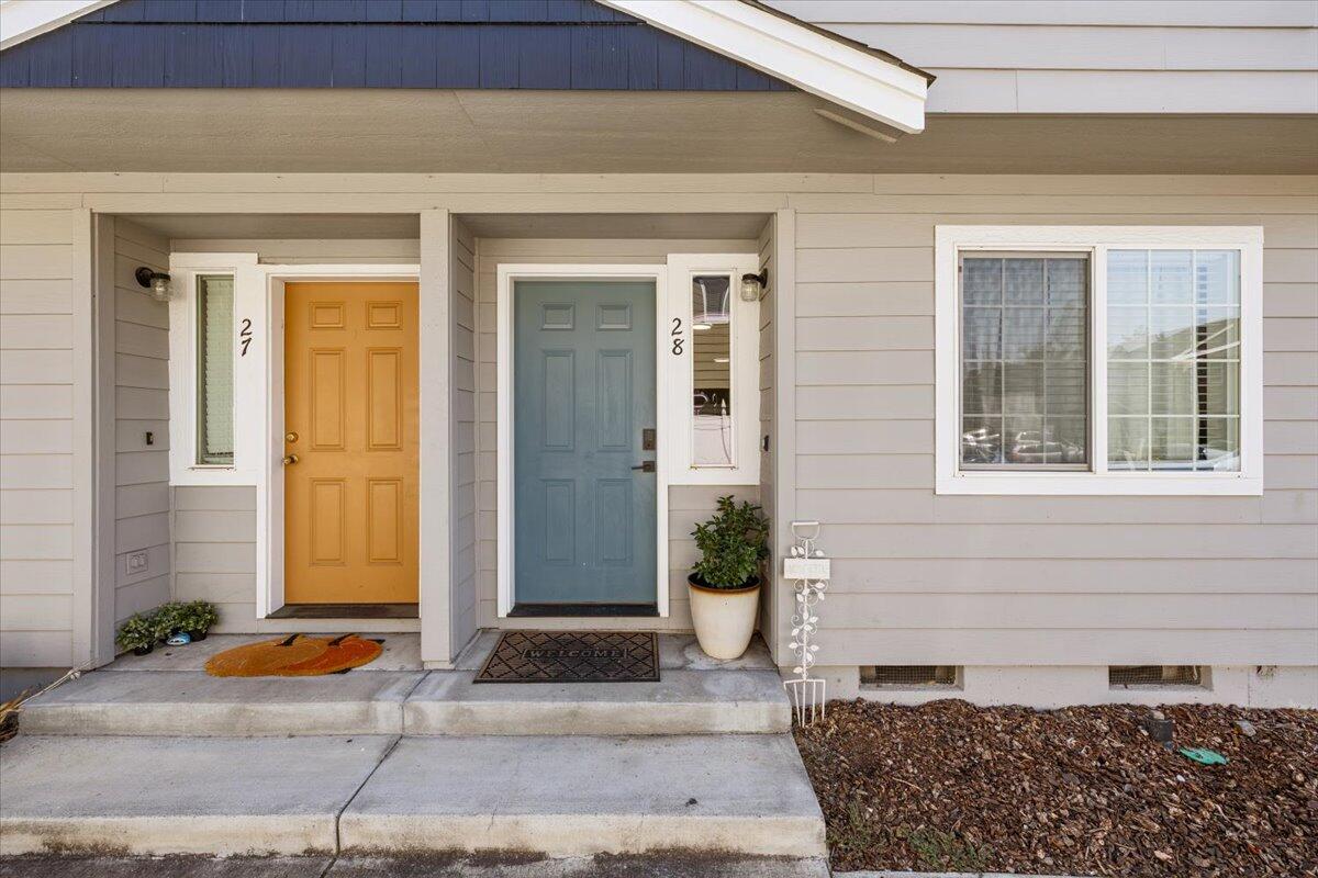 Don't miss this chance to own in East Medford at an amazing price! This 2 bedroom, 1.5 bath townhouse has been thoughtfully updated with all new vinyl flooring, fresh interior paint, updated ceiling lights, new outlets, and upgraded toilets. The layout feels open and inviting with clean, modern touches throughout. Enjoy your own private yard and a freshly repaved back patio that is perfect for relaxing or entertaining. The Oak Court community is quiet, well maintained, and conveniently located near shopping, schools, medical facilities, and the Rogue Valley International Airport. A fantastic opportunity for a first home or rental in a desirable East Medford location!