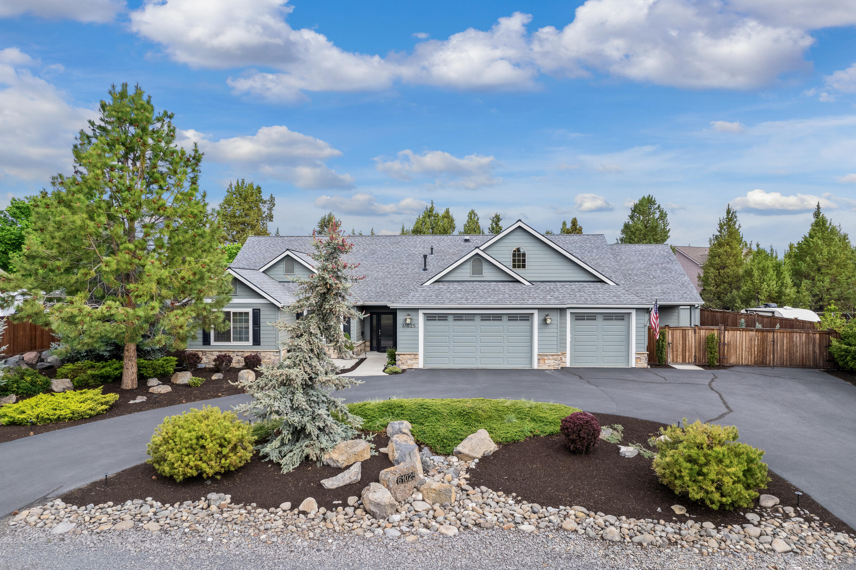 Stunning SINGLE LEVEL home on .46-acre lot with RV PARKING!  Guest suite with separate entrance, patio area, full bathroom and kitchenette is perfect for multi-generational living or care giver.  Kitchen has been renovated to include new stainless-steel appliances, quartz counter tops and refaced cabinets.  Large great room with built-ins and stack stone fireplace.  Huge primary bedroom suite with walk-in closet, handicap accessible bathroom with tile shower and radiant floor heat. Office/Den with French doors and built-in cabinets. Home is light and bright with 5 solar tubes and skylights added to the covered patio.  3-car garage and attic storage with pull down ladder access. Enjoy the private back yard with large paver patio and tranquil water feature.  RV pad behind gate includes 30-amp outlet and sewer dump.  Home recently painted and carpet installed in 2021.  Easy to maintain landscaping on drip system. Close to new 37-acre Alpenglow Park & Larkspur Community Center.