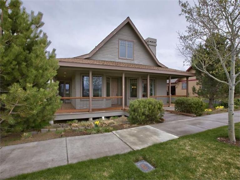 Located in desirable Pine Meadow offering many amenities including tennis courts, swimming pool & walking paths. Only minutes to downtown for shopping & dining. This home has main floor living w/ open kitchen flowing into family room, master bedroom including a large bath w/ soaking tub & walk-in shower, sunroom, office/bedroom, & half bath. Upstairs is 3rd bedroom w/ full bath. Outside provides a covered front porch & open deck for entertaining in the backyard. Oversized 2 car garage w/ plenty storage spac