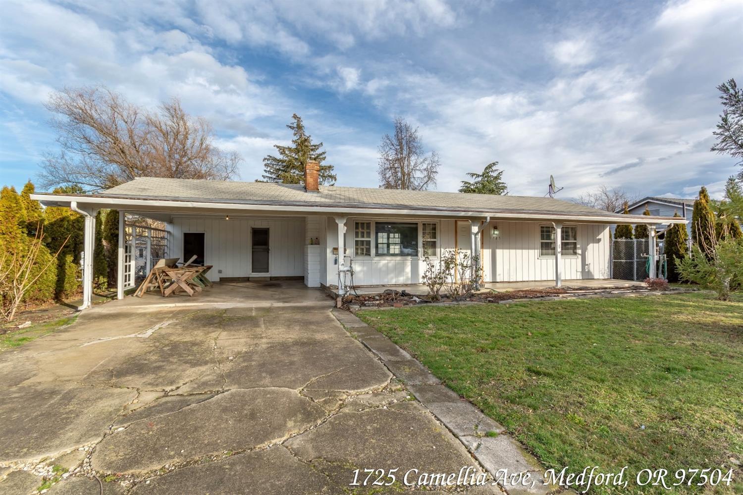 Near North High and Shopping Great for first time home buyer or investor! This single story, 2 Bedroom, 1 Bathroom 1,121 sqft home that sits on a spacious 0.22-acre lot. Includes covered carport for 2 cars, plus two separate detached buildings for plenty of storage. The first outbuilding measures at 15' x 9' and the second is 17' x 10'. Property possibly qualifies for Rehab loan for outside paint and roof repairs. 3D virtual tour, home inspection and floorplan will be available online. Drone and Osmo Video available per request.