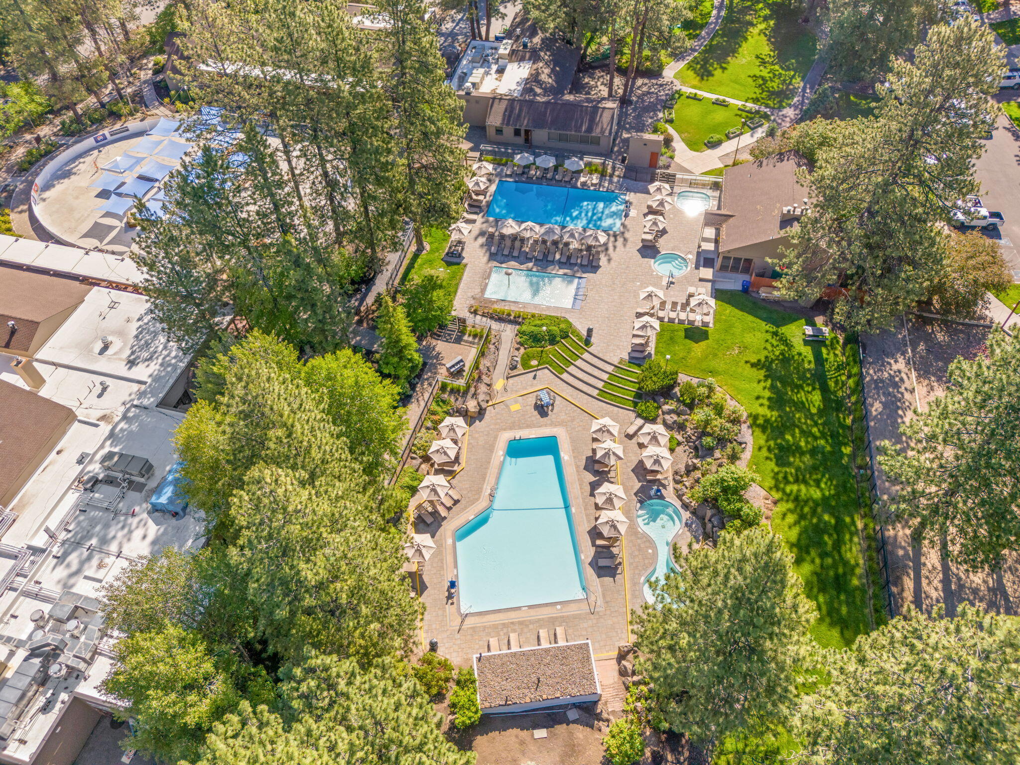 Gorgeous fully furnished and updated ground floor unit at Bend's renowned resort community, Seventh Mountain Resort. This turnkey unit is being sold with everything you need to continue successfully renting out nightly, or use as a second home base camp to year round adventure. The versatile and efficient unit has a queen murphy bed and a separate queen bedroom, plus offers one of the lowest HOA fees in the resort. A wall of windows overlooks the patio above the Deschutes River Canyon where you can walk right out and onto trails leading into the National Forest along the river. The resort draws tourist year round with amenities such as pools, hot tubs, a fitness center, pickle ball, tennis, volleyball, mini golf, disc golf course, ice skating rink, a restaurant/bar and more! Mt Bachelor winter sports, rafting, mountain biking and all that Bend offers are waiting, just minutes from 7th Mountain!
