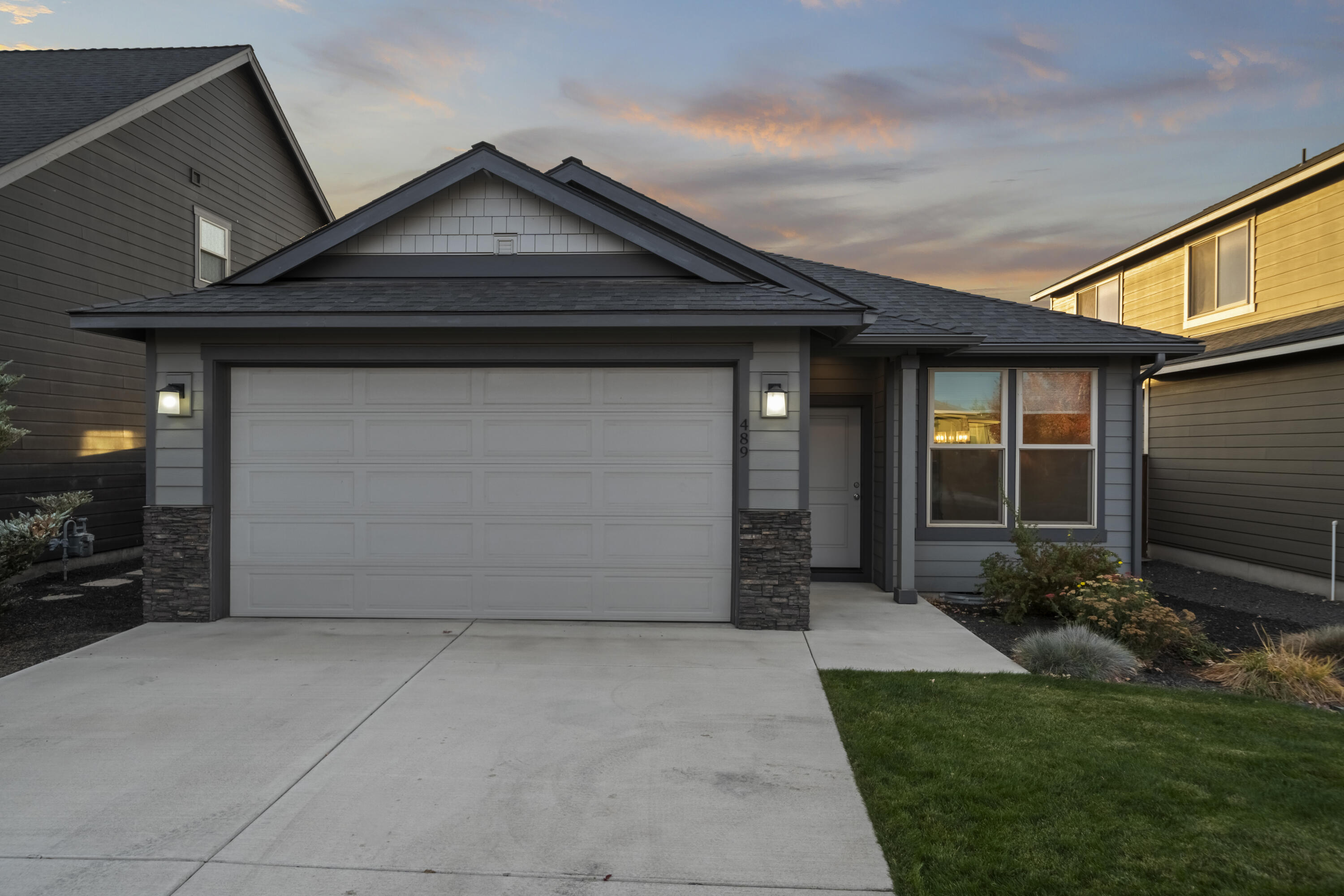 Amazing opportunity to own this turn key single level home in NW Redmond. Peek-a-boo mountain views from the covered patio. Easy living with HOA maintained front yard, carpet and LVP flooring throughout, stainless appliances, upgraded stone fireplace with mantle, and granite countertops. Built in 2019, this home offers modern comfort, efficient layout, and an ideal low maintenance lot. This home has been lightly lived in and is ready for it's new owners!