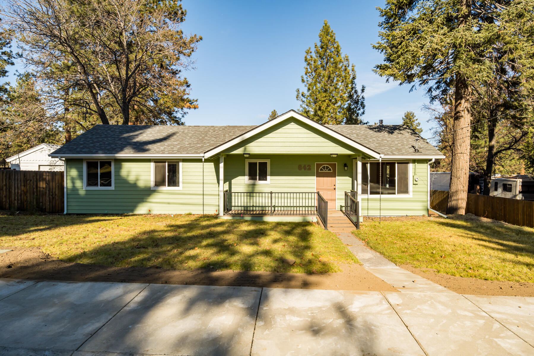 Charming 1950s Midtown Gem - Move-In Ready! 3-bed, 2-bath home in desirable Franklin area of midtown Bend. This well-maintained 1,462 sq ft classic combines vintage charm with modern updates including a brand-new roof and fresh interior as well as exterior paint throughout. The generous lot features a spacious maintenance free deck and a fenced yard for privacy, and has plenty of room for convenient RV/boat storage - perfect for outdoor enthusiasts.  Located in the heart of midtown Bend, enjoy easy access to local shops, restaurants, and parks while maintaining a peaceful residential setting. Excellent condition throughout and priced to sell - this is a fabulous opportunity to own in a prime Bend location. Don't miss this rare find!