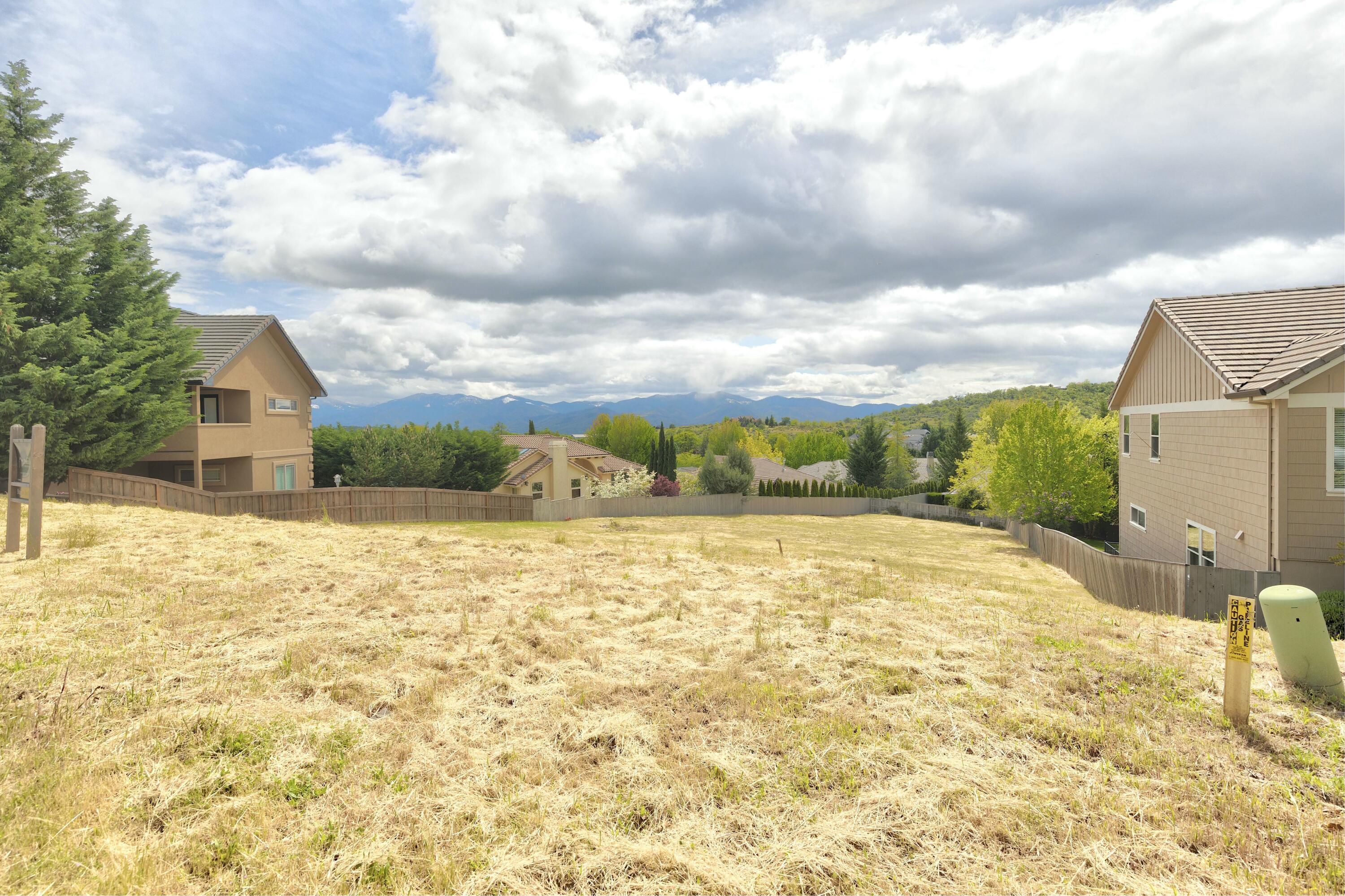 Wonderful lot in the Saddle Ridge development! Your chance to build that dream home in the established 2nd phase of this subdivision, surrounded by gorgeous homes and amazing views. This property is situated to offer a main floor entry design with a daylight basement and plenty of yard space. Don't have a builder? This property is builder owned, so bring your dreams and let us help you navigate your custom build today!