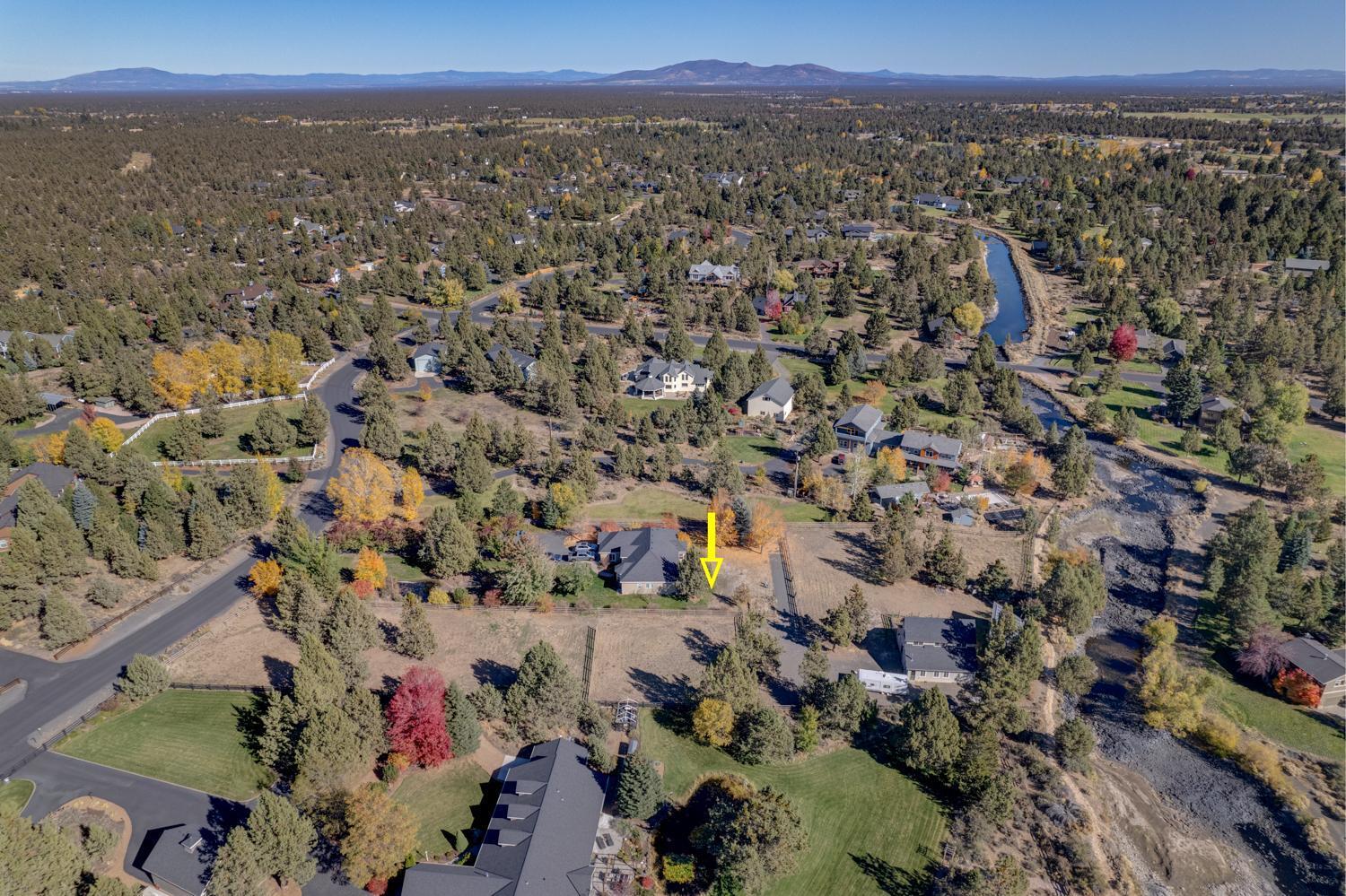 Enjoy quiet country style living right in Bend! 3 bed, 2.5 bath, 2,199 sf single level house on 2.55 acres in Old Deschutes. The equine enthusiast will love the 1,440 sf loft barn with 3 large stalls and fenced dry lot, 576 sf hay storage shed and cross-fenced pastures. 1.75 acres of water rights for the pastures and in-ground sprinklers. The barn has a heated shop, tack room, storage room and upper level bonus/recreation room with a gas fireplace and large windows. Beautifully landscaped  grounds include a pond, fire pit, flagstone walkways and many trees. PV Powered Solar System, a canal location and plenty of RV parking space make this a must see!