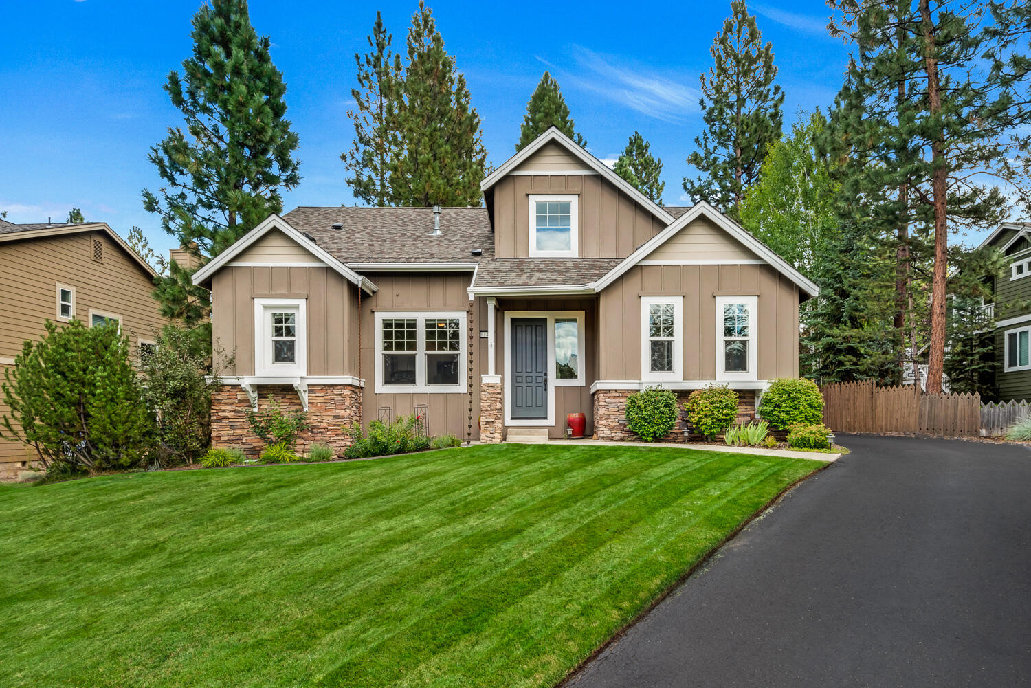 Impeccably remodeled home on a premium/private lot in the centrally located Parks at Broken Top. The open floorplan shows off the upgraded kitchen, featuring white quartz countertops, white shaker cabinetry, luxury appliances & countertop-to-ceiling tile backsplash. Spa-like primary suite resides on the private main-level wing, with two guestrooms upstairs sharing a central bath. Relax in the vaulted great room with cozy gas fireplace, or retreat to get work done in the downstairs home office. Multiple linen & coat closets afford for ample storage, in addition to the oversized garage detached via a covered walkway to the main home. Enjoy the peaceful water feature in the home's secluded backyard that backs to community greenspace. Across the street you'll find the community's common lawn area, basketball court & swimming pool to enjoy with friends and/or family. This is Bend westside value not to be missed.