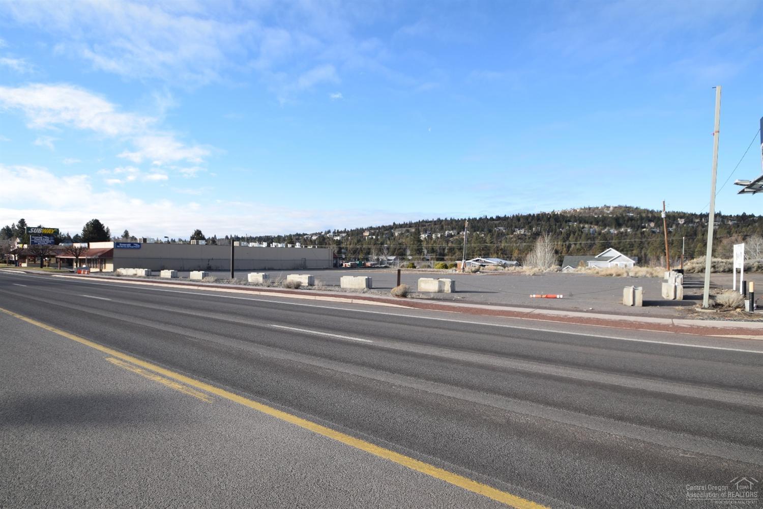 This prime 1.11 acre commercial lot is located west of ShopKo and north of Subway & Applebee's. Clean Phase I Environmental, confirmed ingress/egress to Highway 97 Business. Construction of increased sewer capacity will begin in February of 2016 with an expected delivery date of November 2016.