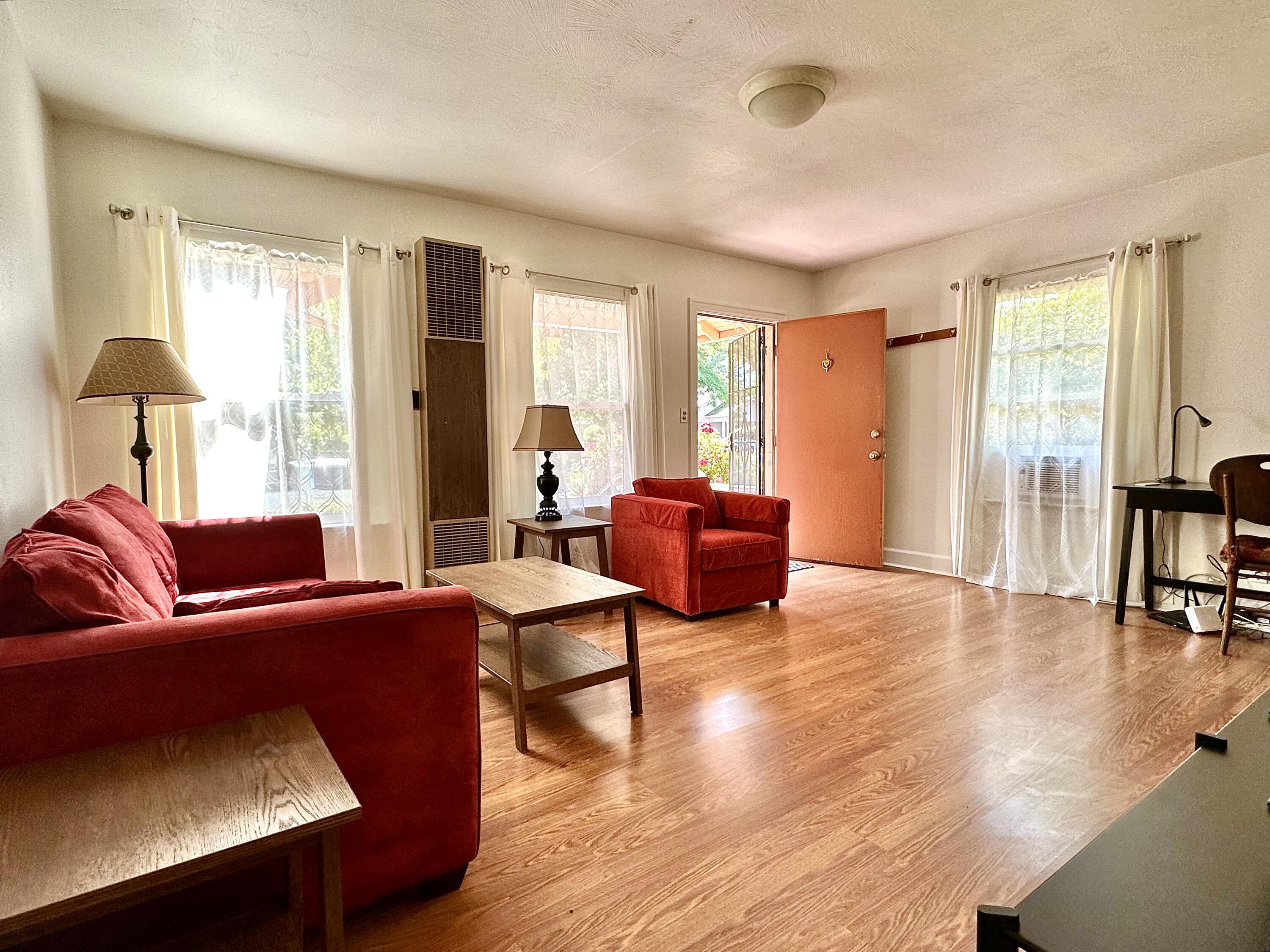 Charming multiplex super close to downtown Ashland with excellent income, lots of off street parking and mature trees. The two units in front have great craftsman-style curb appeal with covered painted concrete porches. Both front units have 805 sqft, 1 bedroom, 1 bathroom, large laundry room with sink, open great room with kitchen, dining room and living room, laminate wood & vinyl flooring, vinyl windows. Kitchens have laminate countertops, pantry, gas range, breakfast bar, and lots of cabinets. The dining rooms have a lovely original built-in hutch. The studio in the back has a covered front patio, kitchenette, vaulted ceilings, and access to a fenced back yard. Storage shed and appliances included. Separate electric and water meters. Off-street parking for 3+ cars off of alleyway in the back plus lots of room for on-street parking in the front on Helman Street. Concrete pathways and lawn space around the property. Currently leased by OSF.